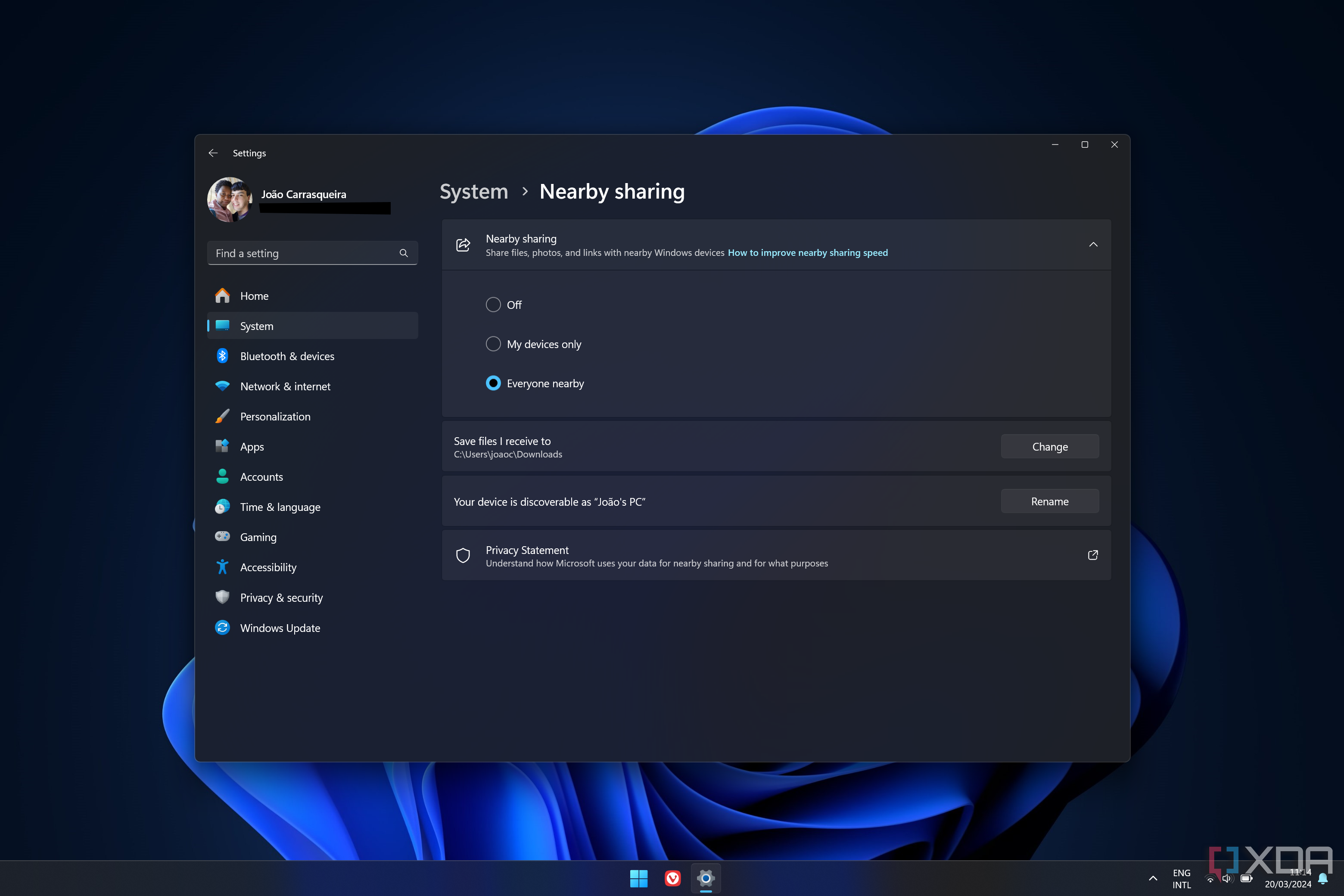 Screenshot of Windows 11 desktop showing nearby sharing settings