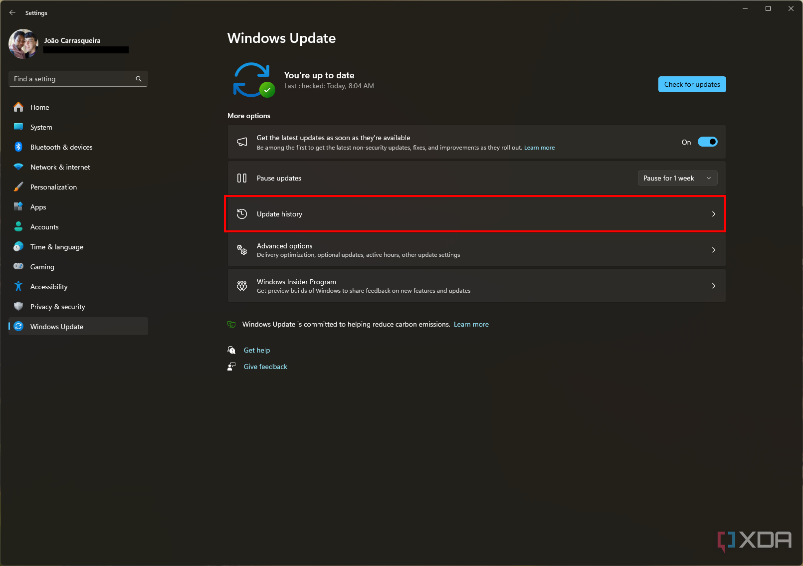 Captura de pantalla de Windows Update con el botón Historial de actualizaciones resaltado