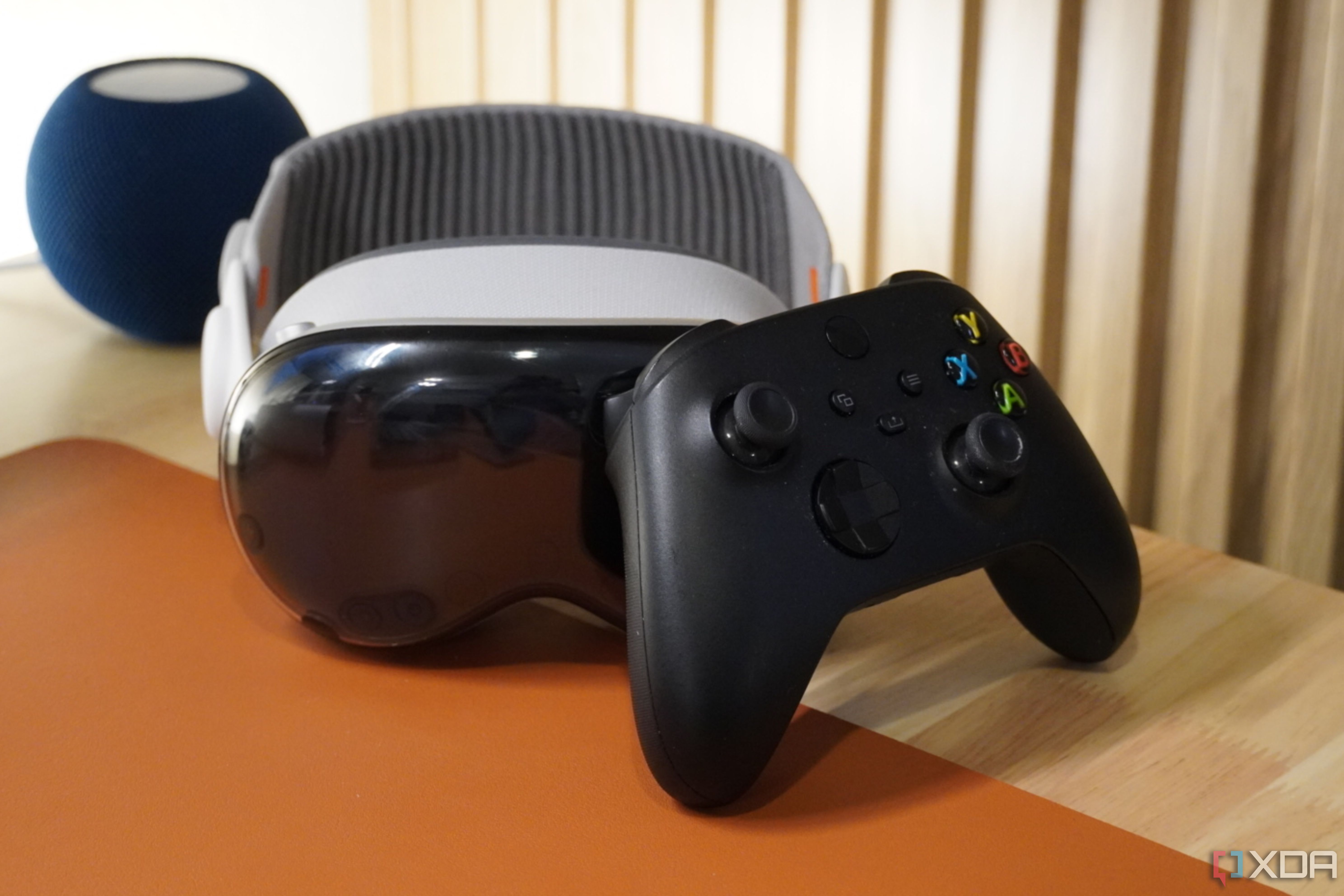 A Vision Pro headset with a controller.