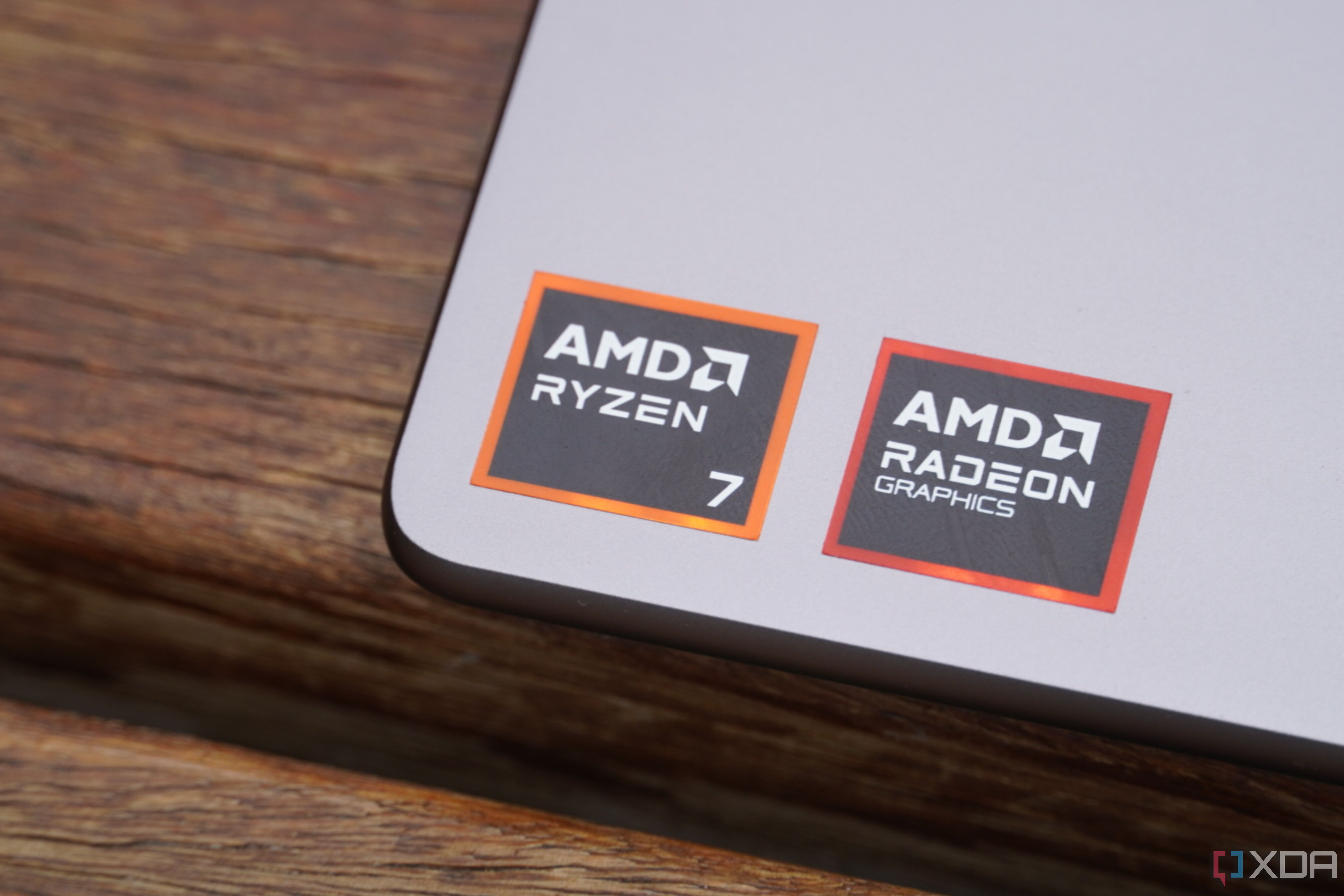 The AMD stickers on a Yoga 7 laptop.