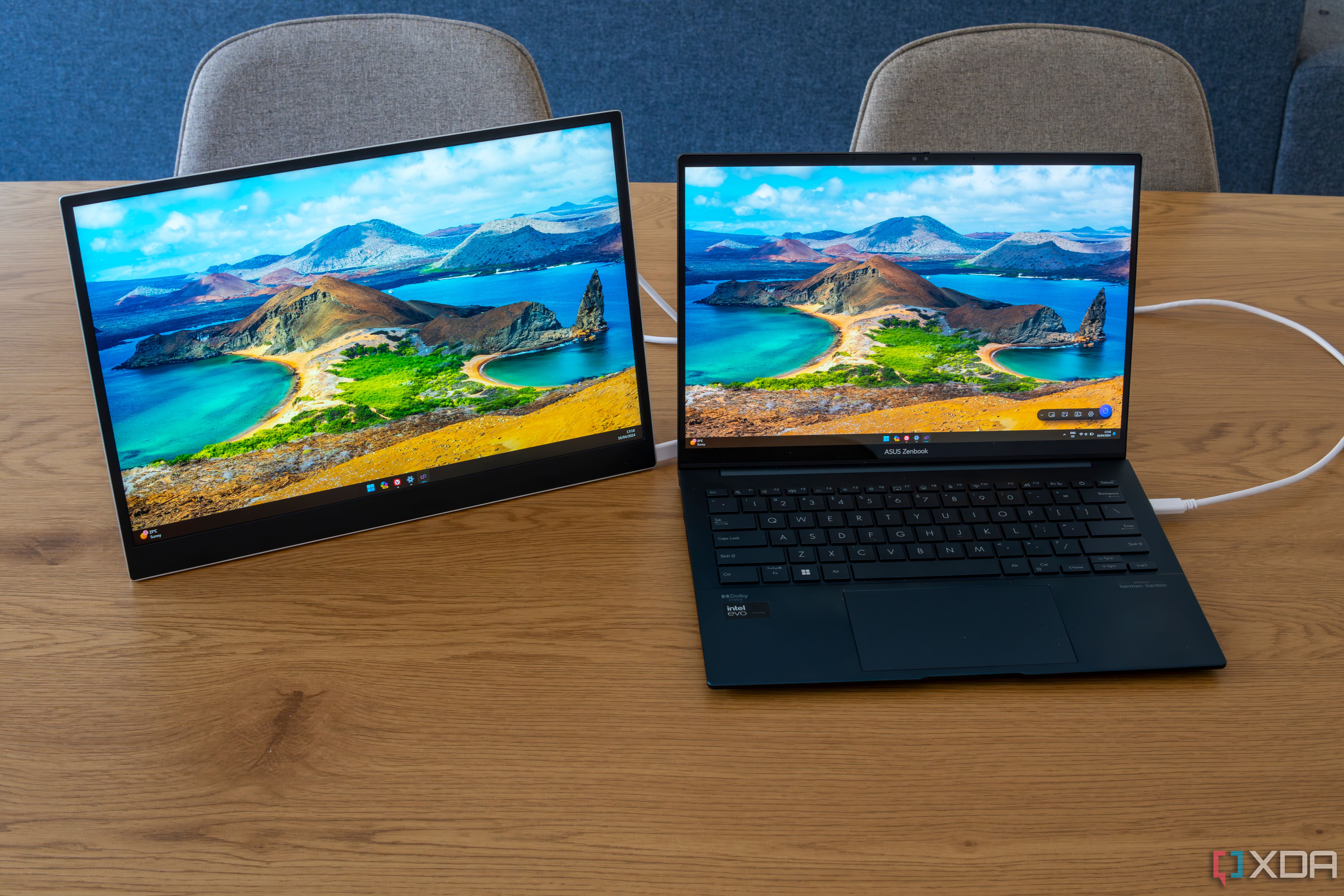 An LG Gram +View next to a laptop with both screens showing the Windows 11 desktop 