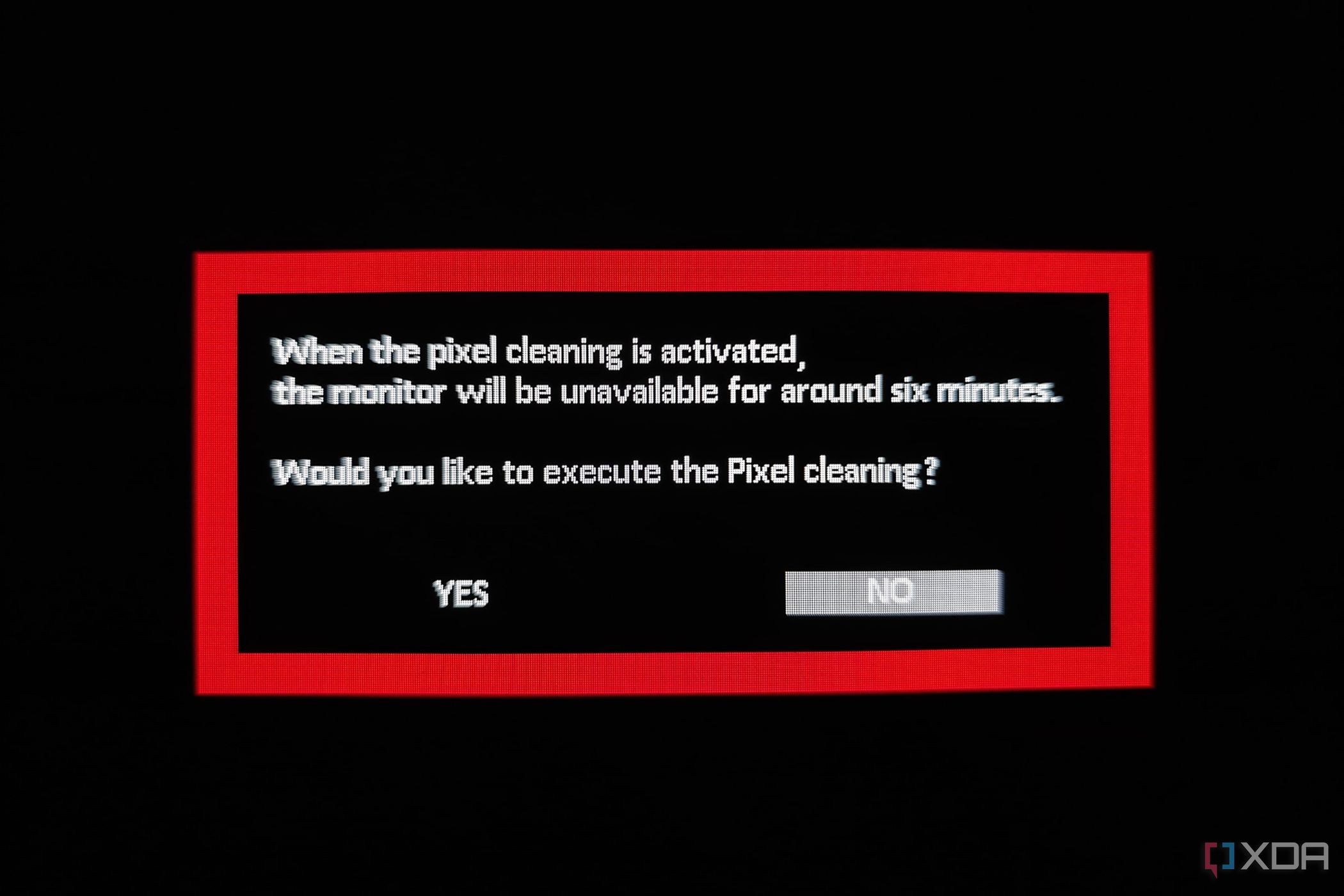 Изображение, показывающее Pixel Всплывающее окно процедуры очистки на игровом мониторе ASUS ROG Swift PG27AQDM.