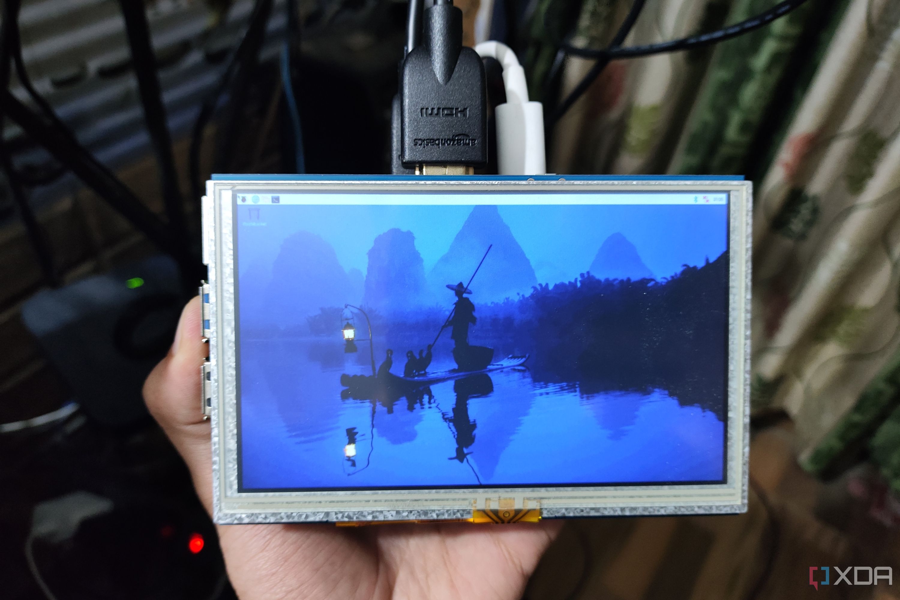 A Raspberry Pi 5 with a portable display attached to it