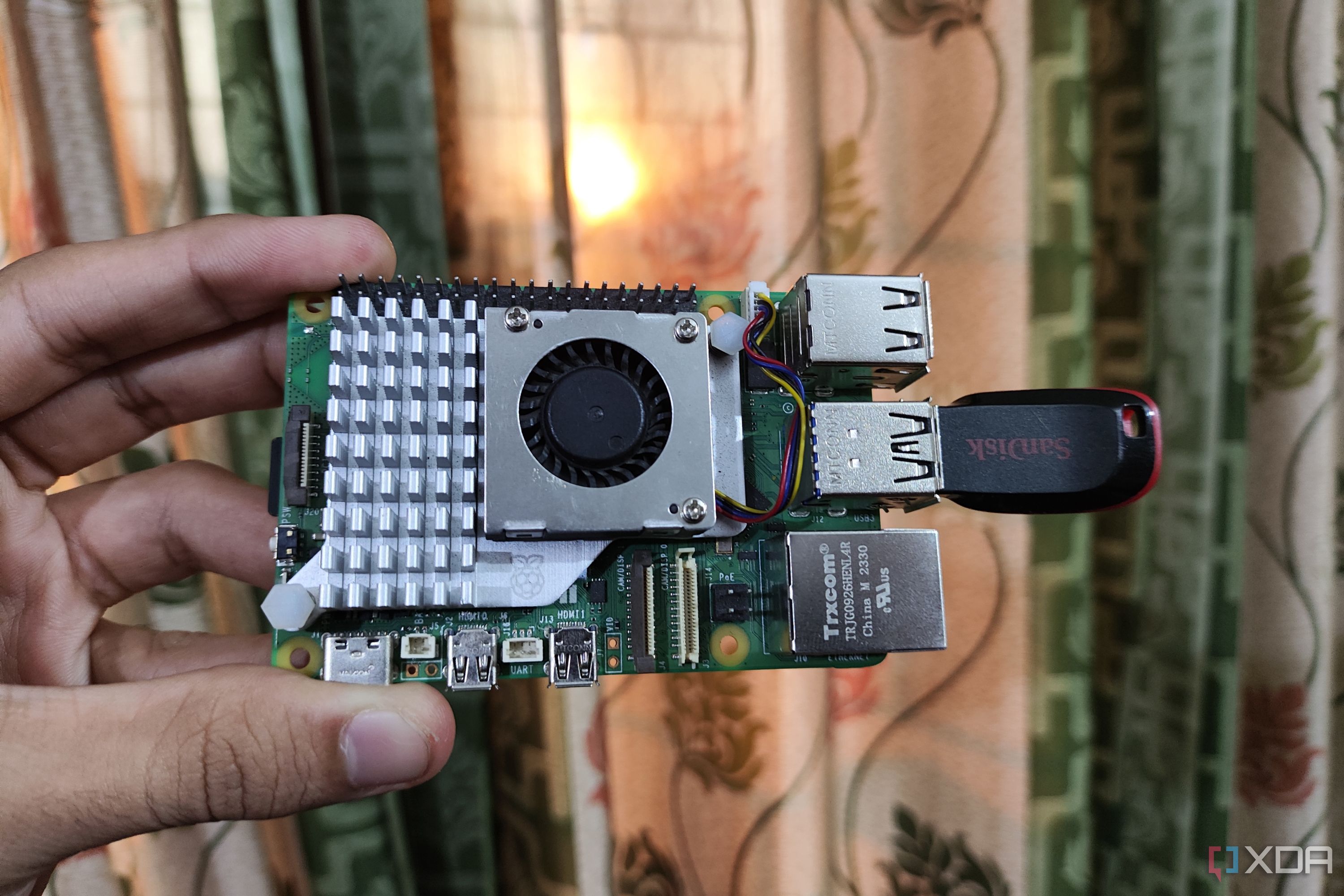 A Raspberry Pi 5 with a USB drive attached to it
