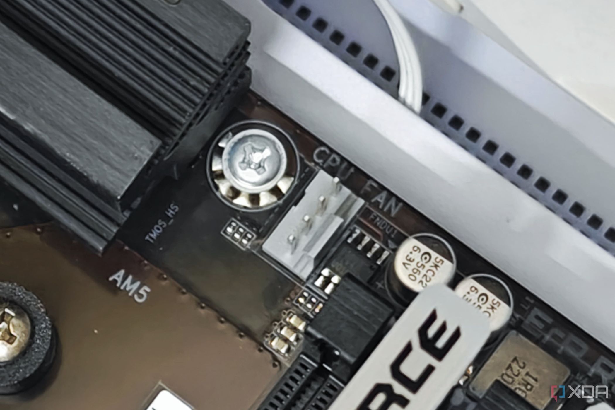 An image showing a close up of the CPU FAN header on an AM5 motherboard.