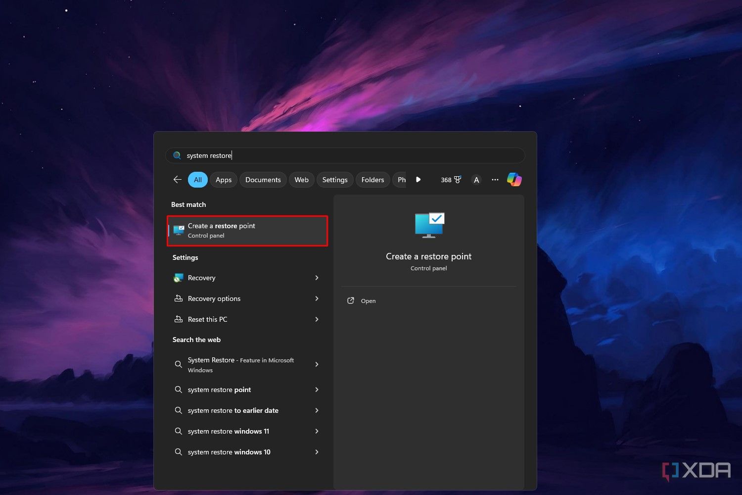 Captura de pantalla de Windows 11 que resalta la función Restaurar sistema en el panel de control del menú Inicio