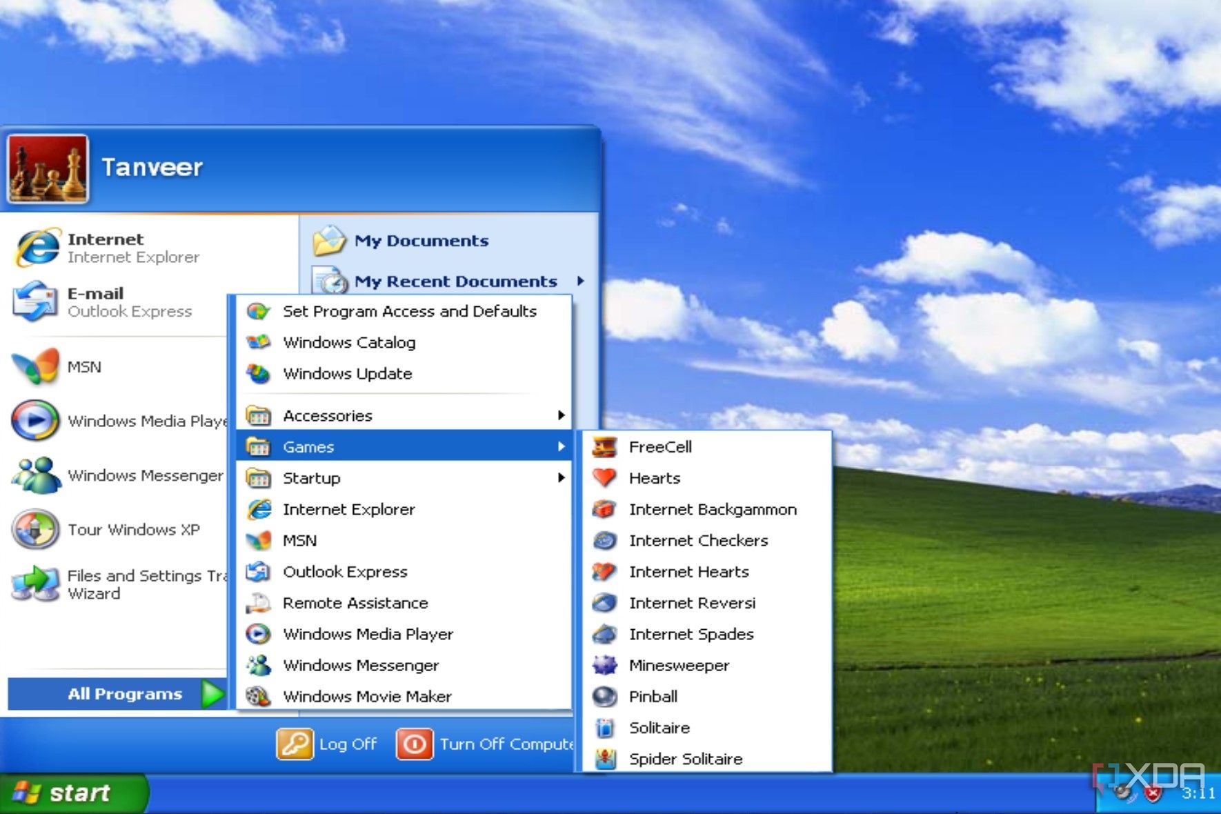 Снимок экрана рабочего стола Windows XP с меню «Пуск» и предустановленными играми.