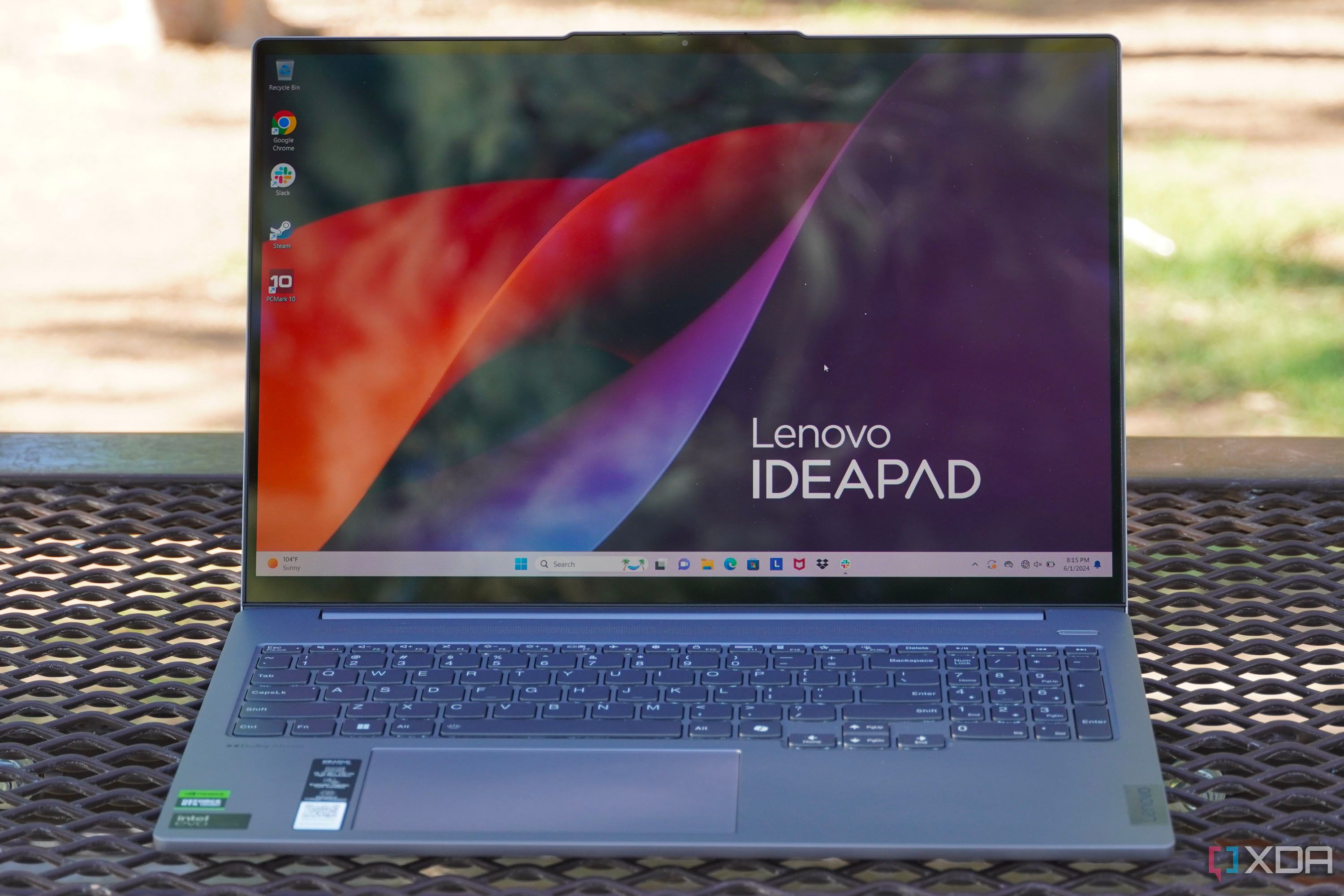 The Lenovo IdeaPad Pro 5i on a table showing the desktop.