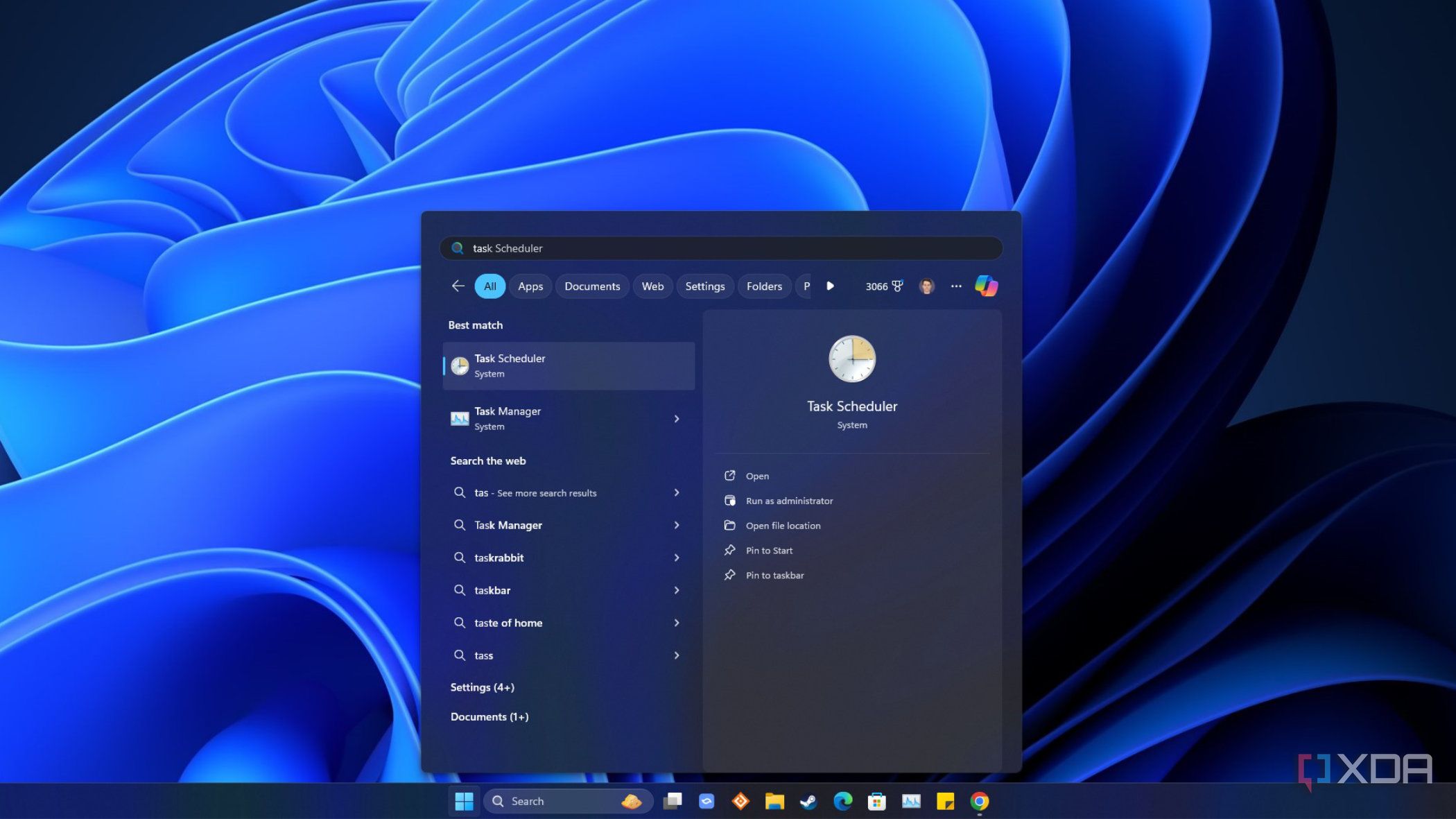 windows 11 desktop with start menu open showing task scheduler