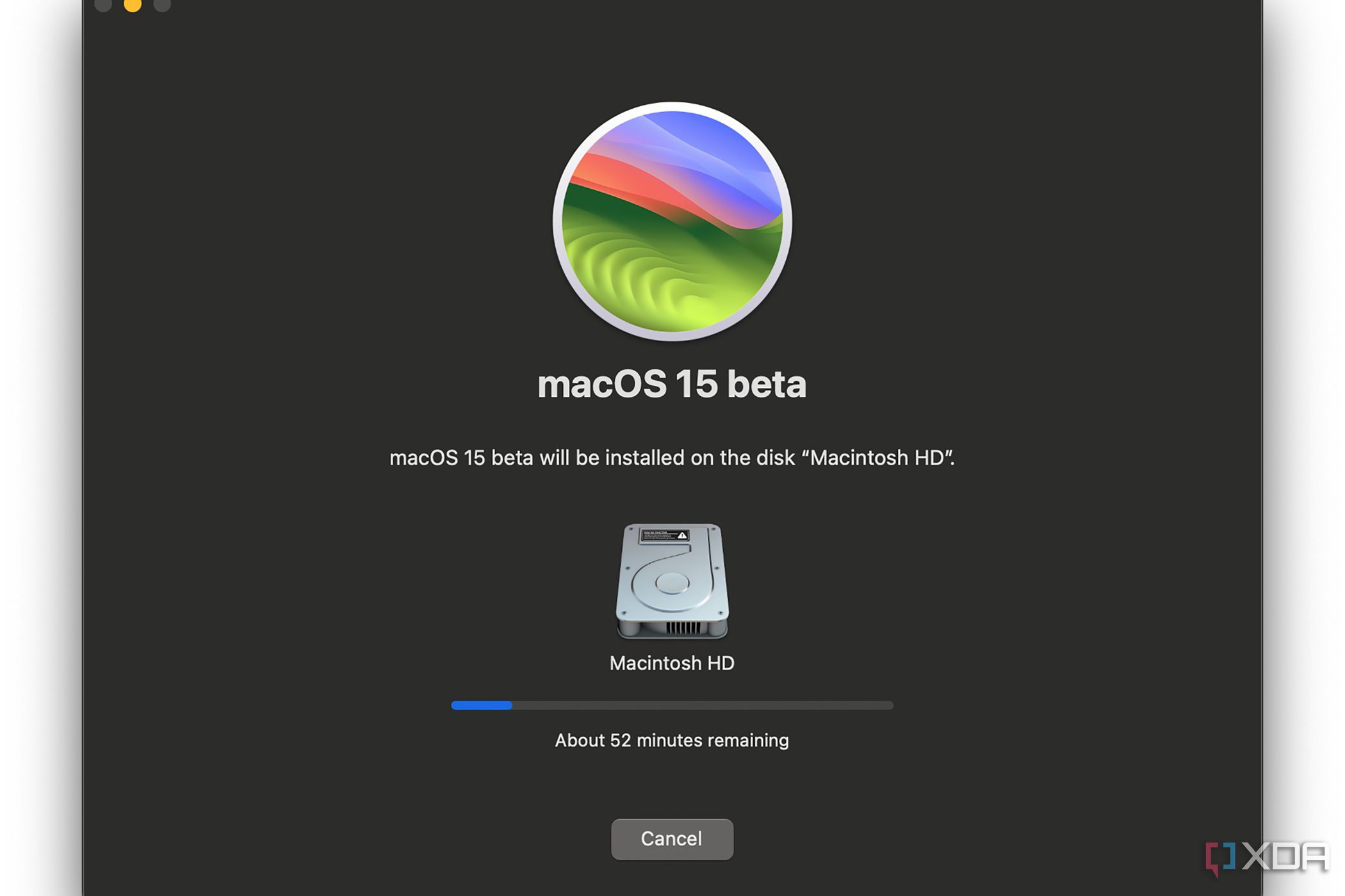 Se muestra la instalación beta de macOS 15 en una Mac en progreso con 52 minutos restantes.