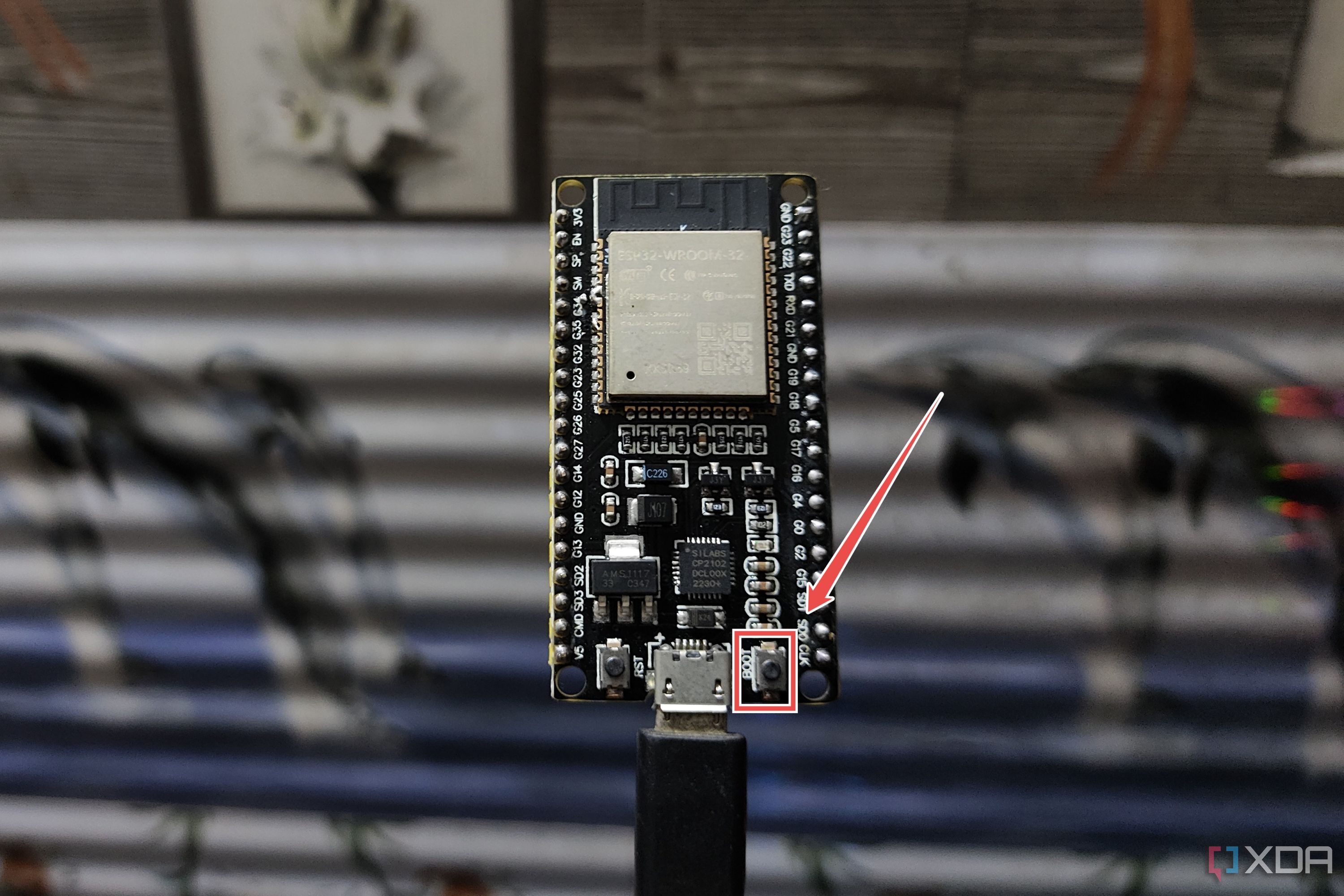 El botón de arranque resaltado en el ESP32