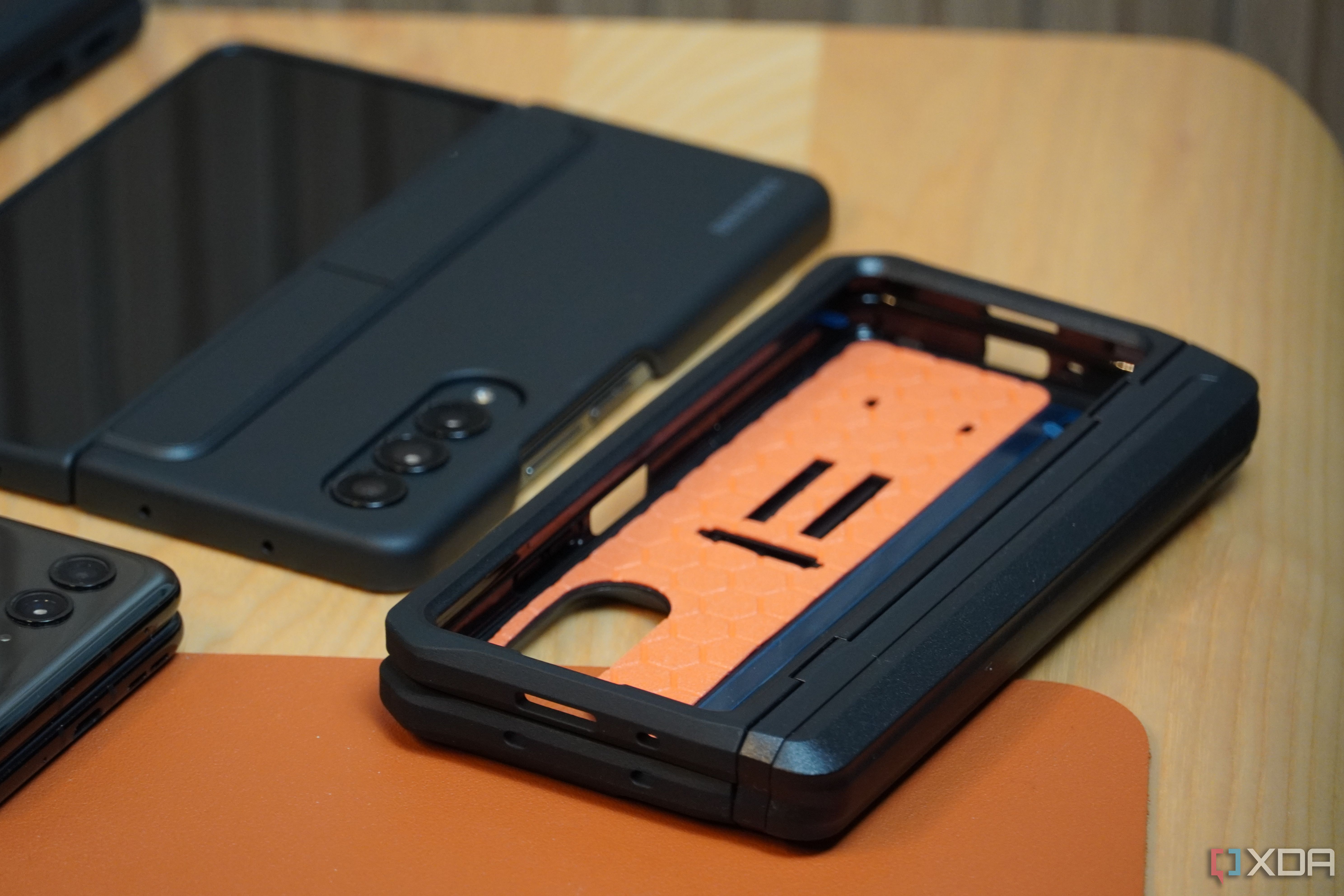 Folding phones next to cases.