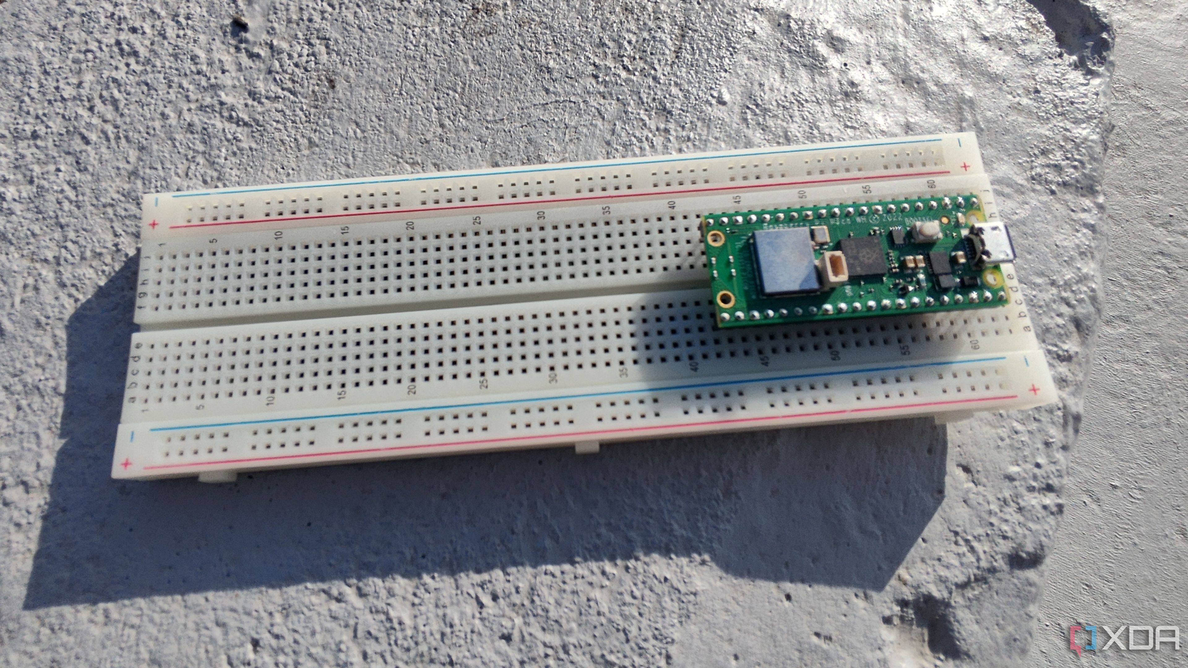 Plugging a Raspberry Pi Pico into a breadboard