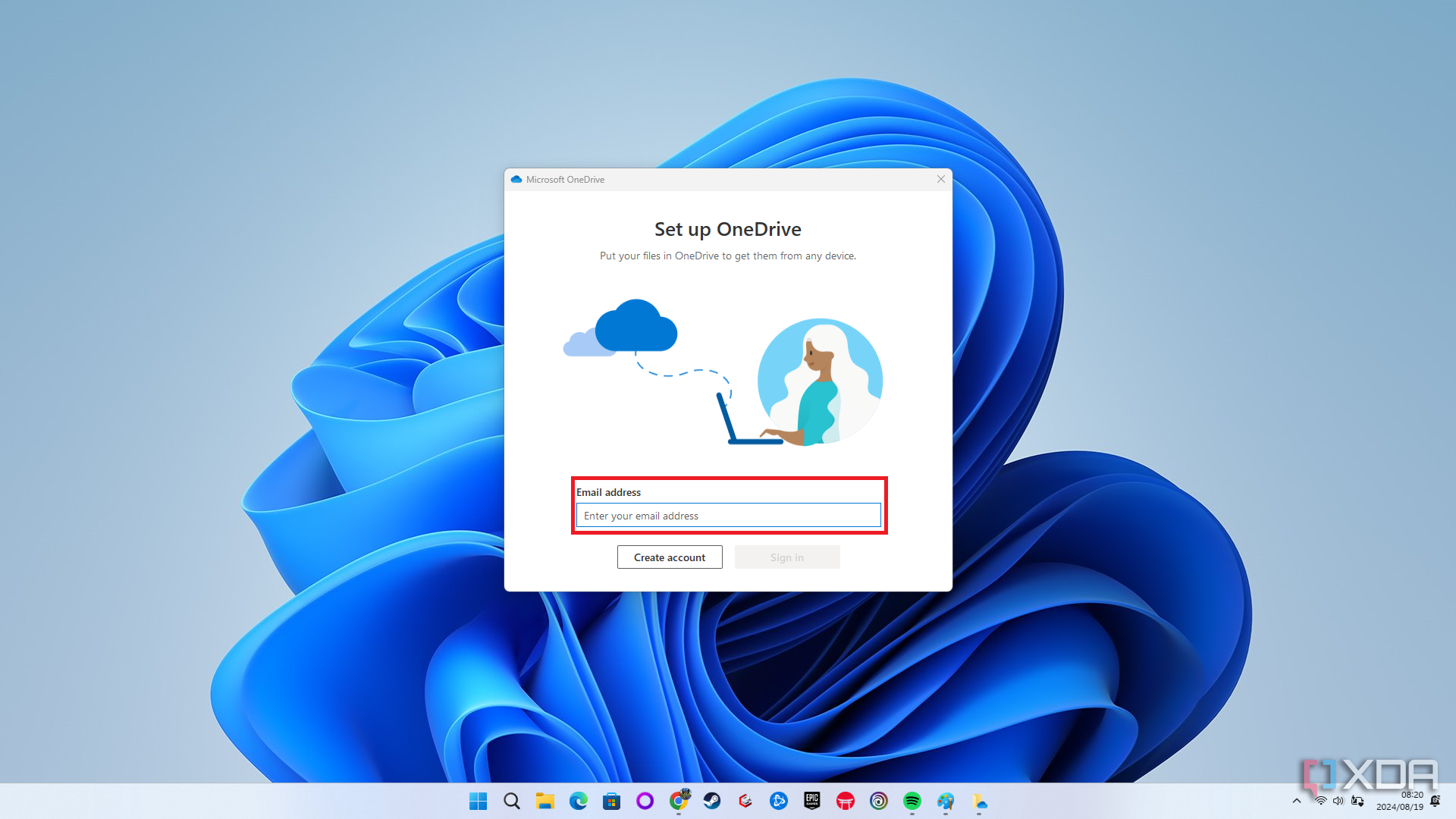 El asistente de inicio de sesión de OneDrive que se muestra en la pantalla de una computadora