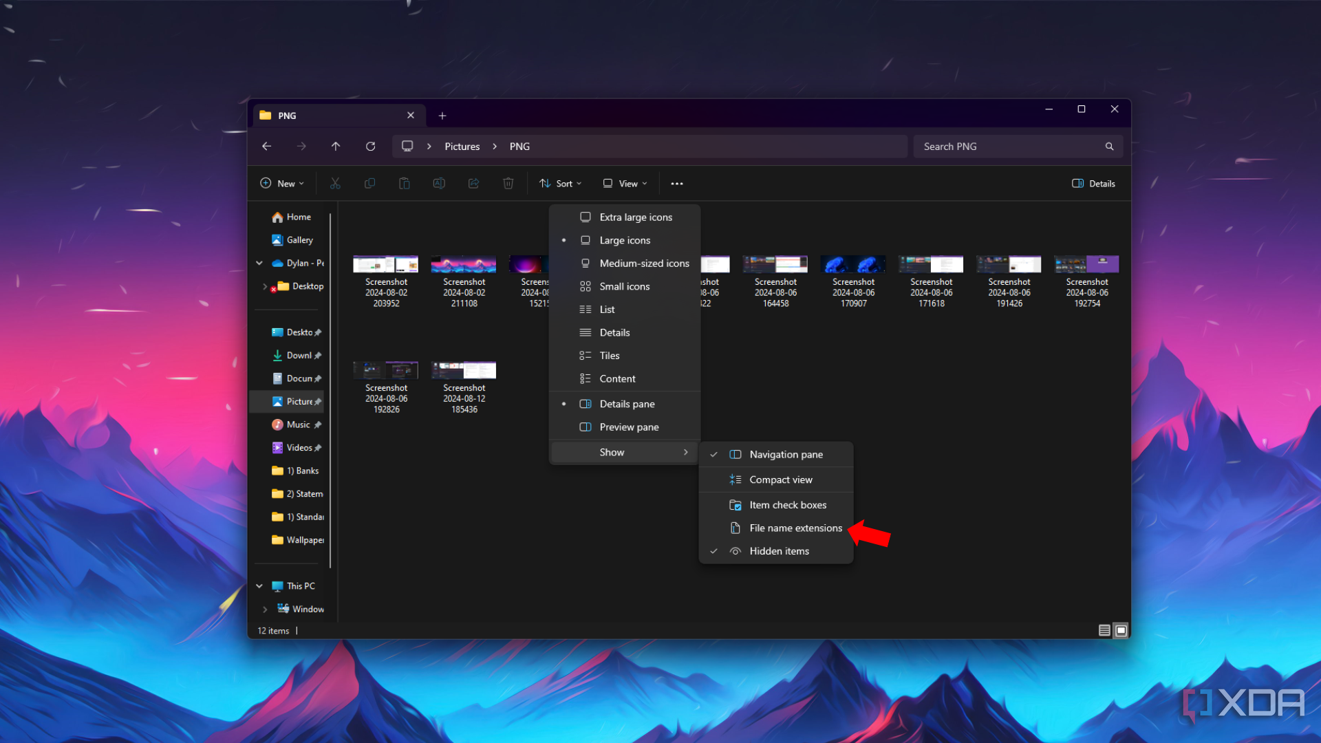 Una flecha que apunta a la configuración de visualización de extensiones de archivo