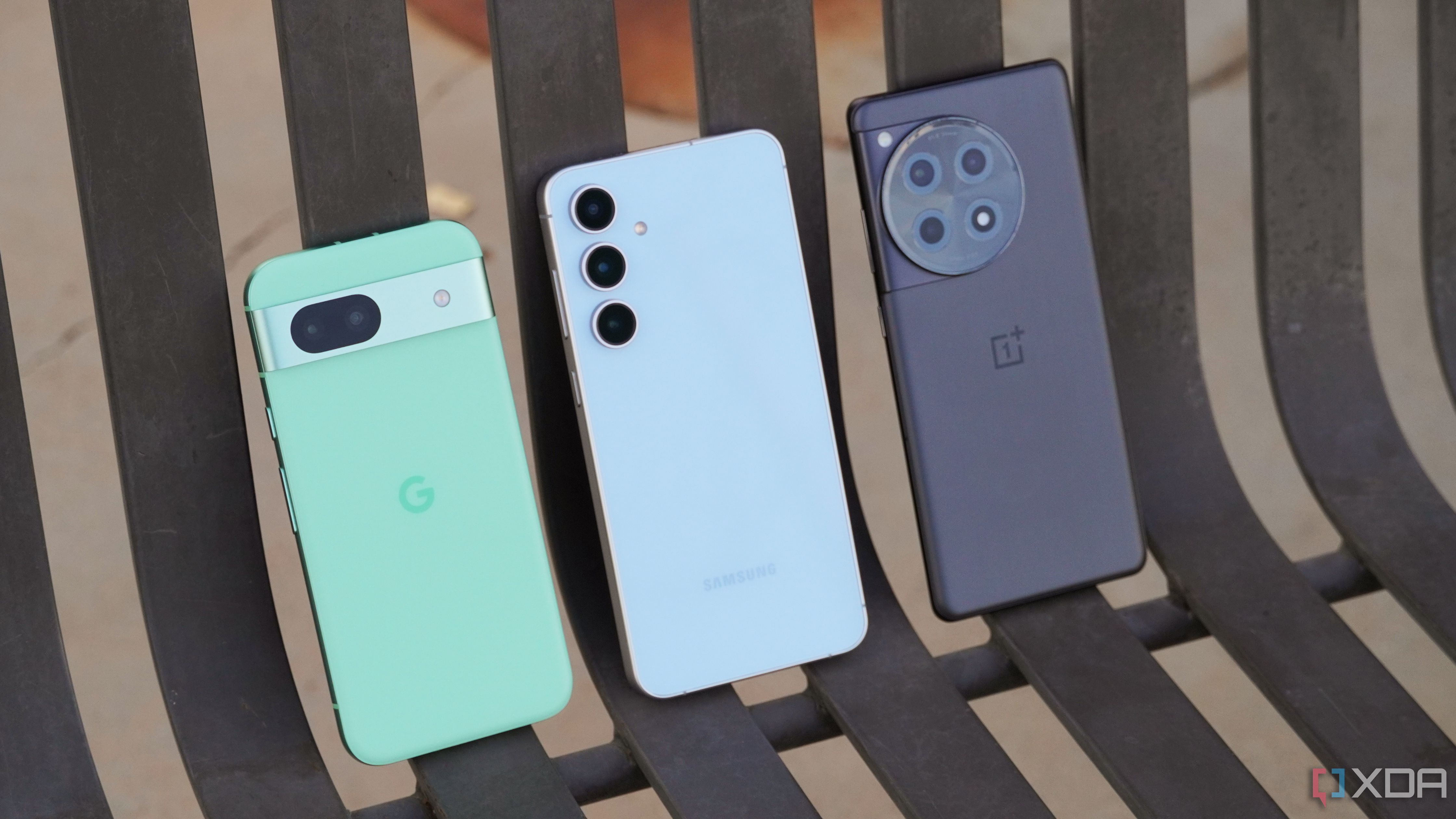 The Google Pixel 8a, Samsung Galaxy S24 FE, and OnePlus 12R.