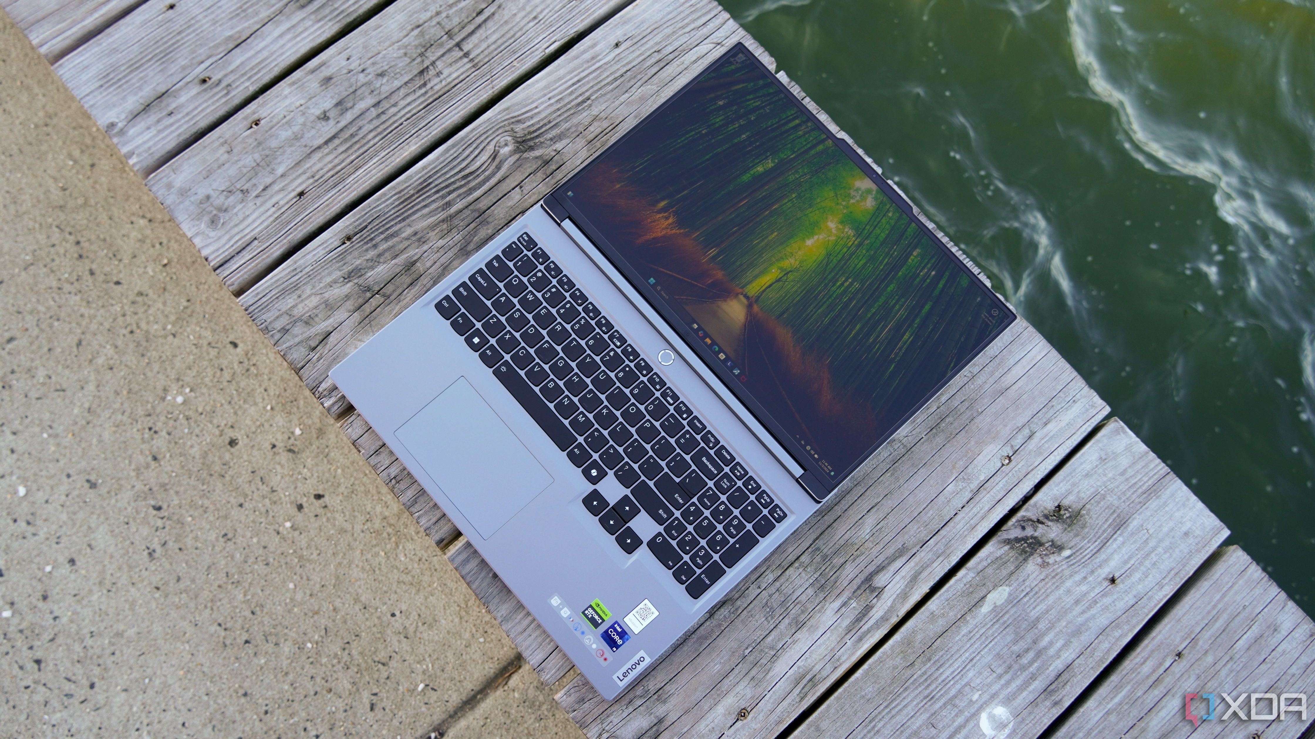 The Lenovo Legion 5 lying flat outdoors.