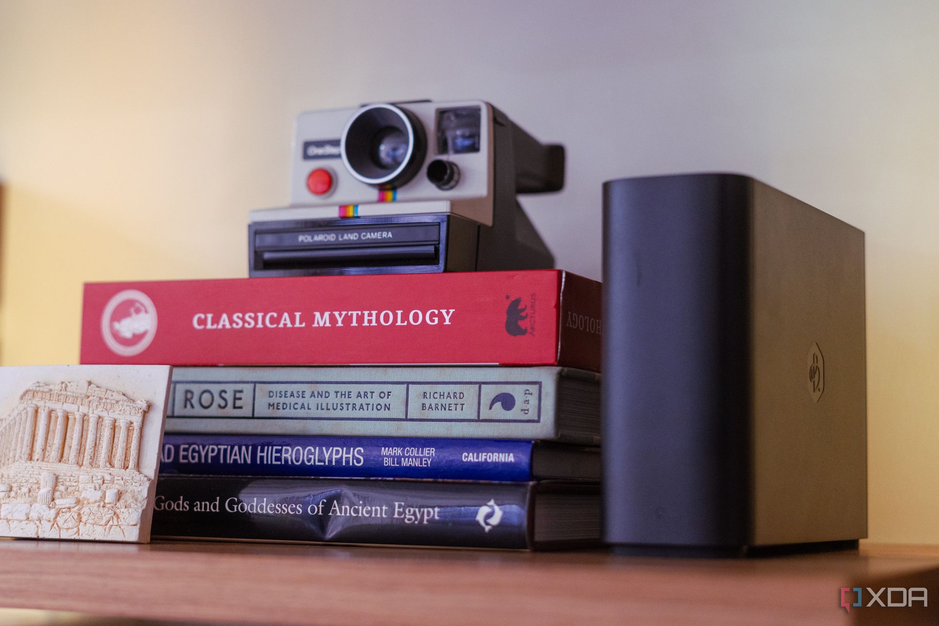 Picture of Synology BeeStation NAS on a bookshelf
