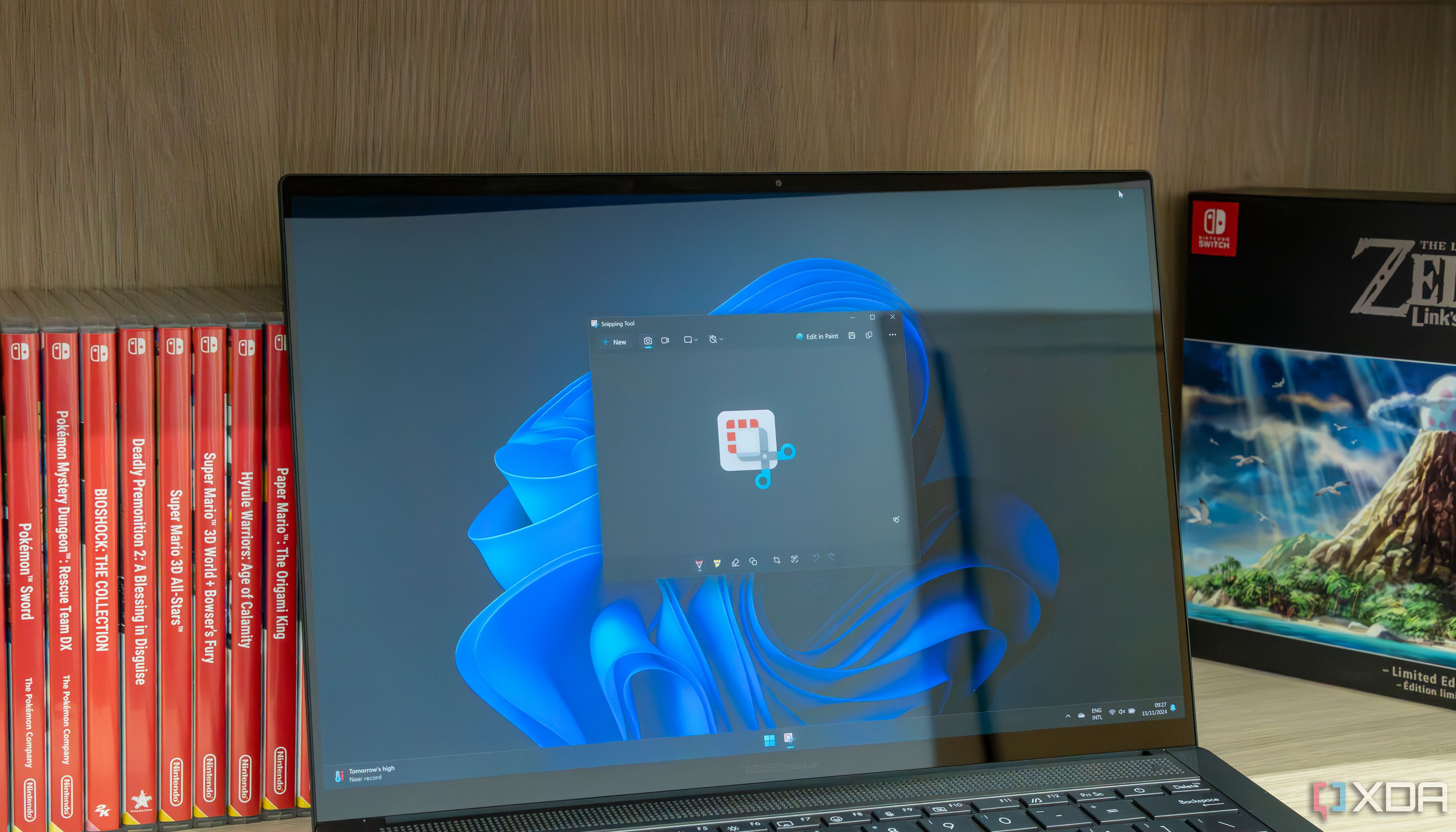 A Windows 11 laptop running the Snipping Tool app with the app's logo show on screen