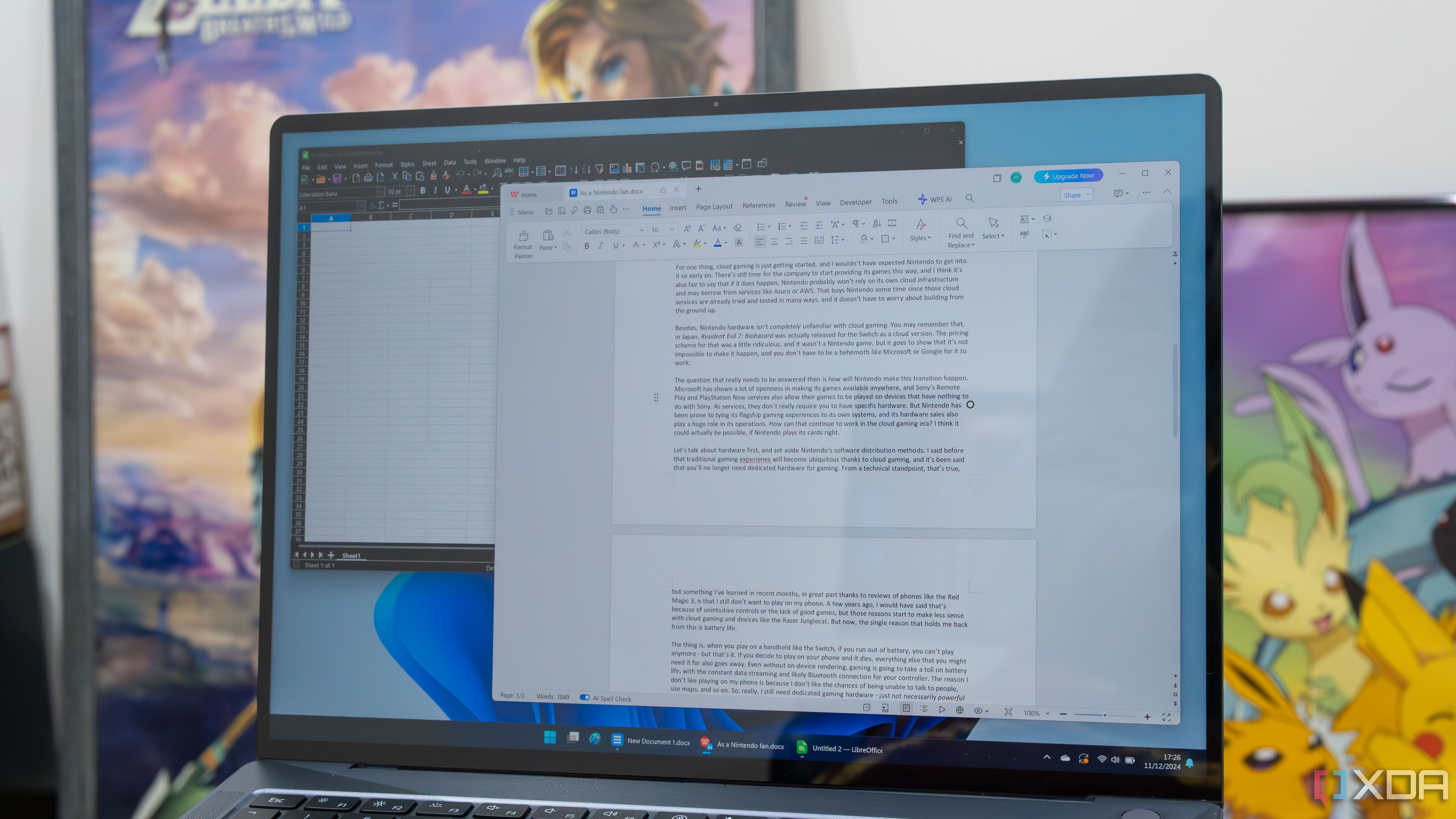 Una computadora portátil con Windows 11 que ejecuta WPS Office y LibreOffice Calc