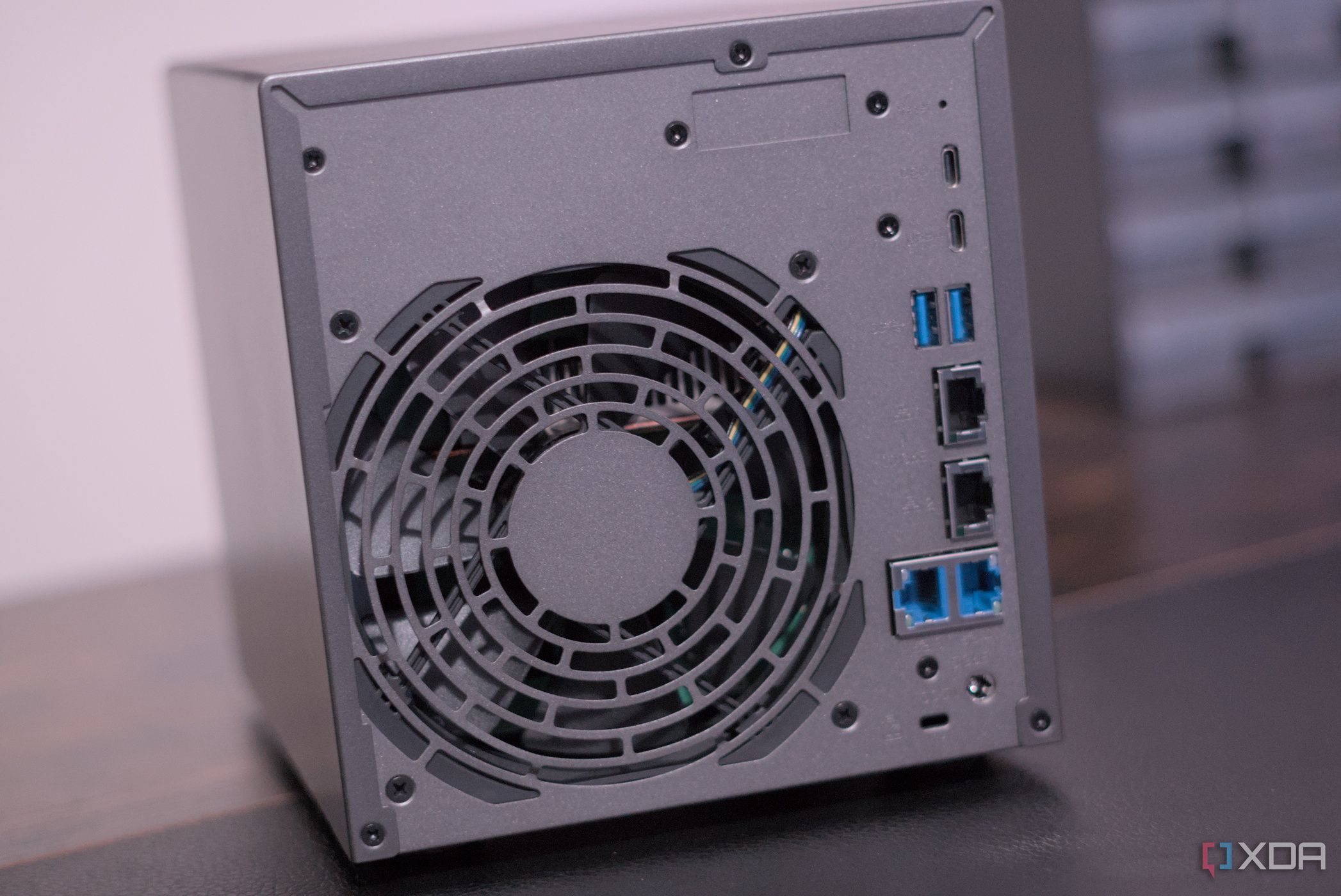 Asustor AS6804T from the back, kept on a desk