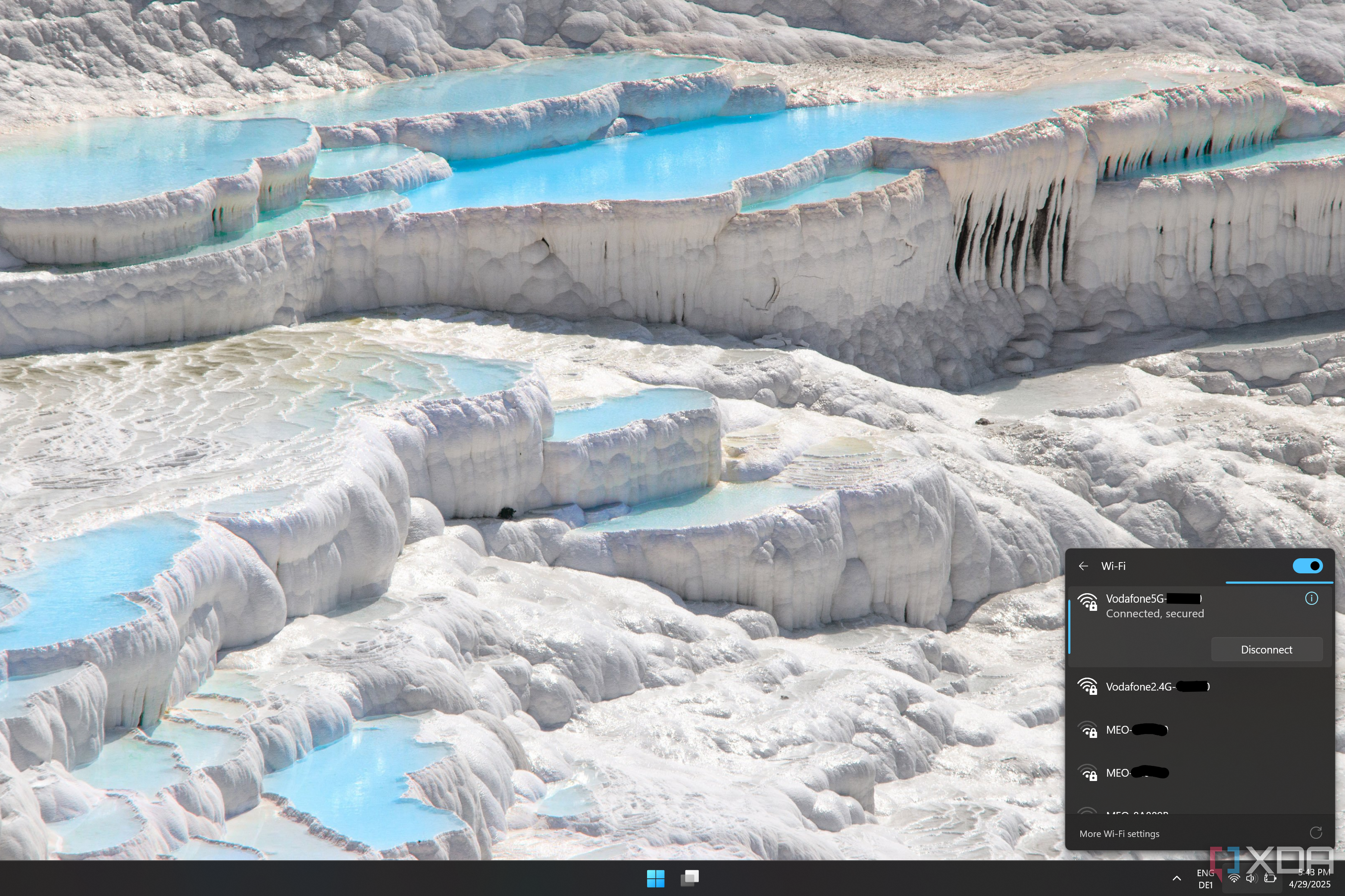 Screenshot of Windows 11 desktop showing a 2.4GHz and a 5GHz version of the same network