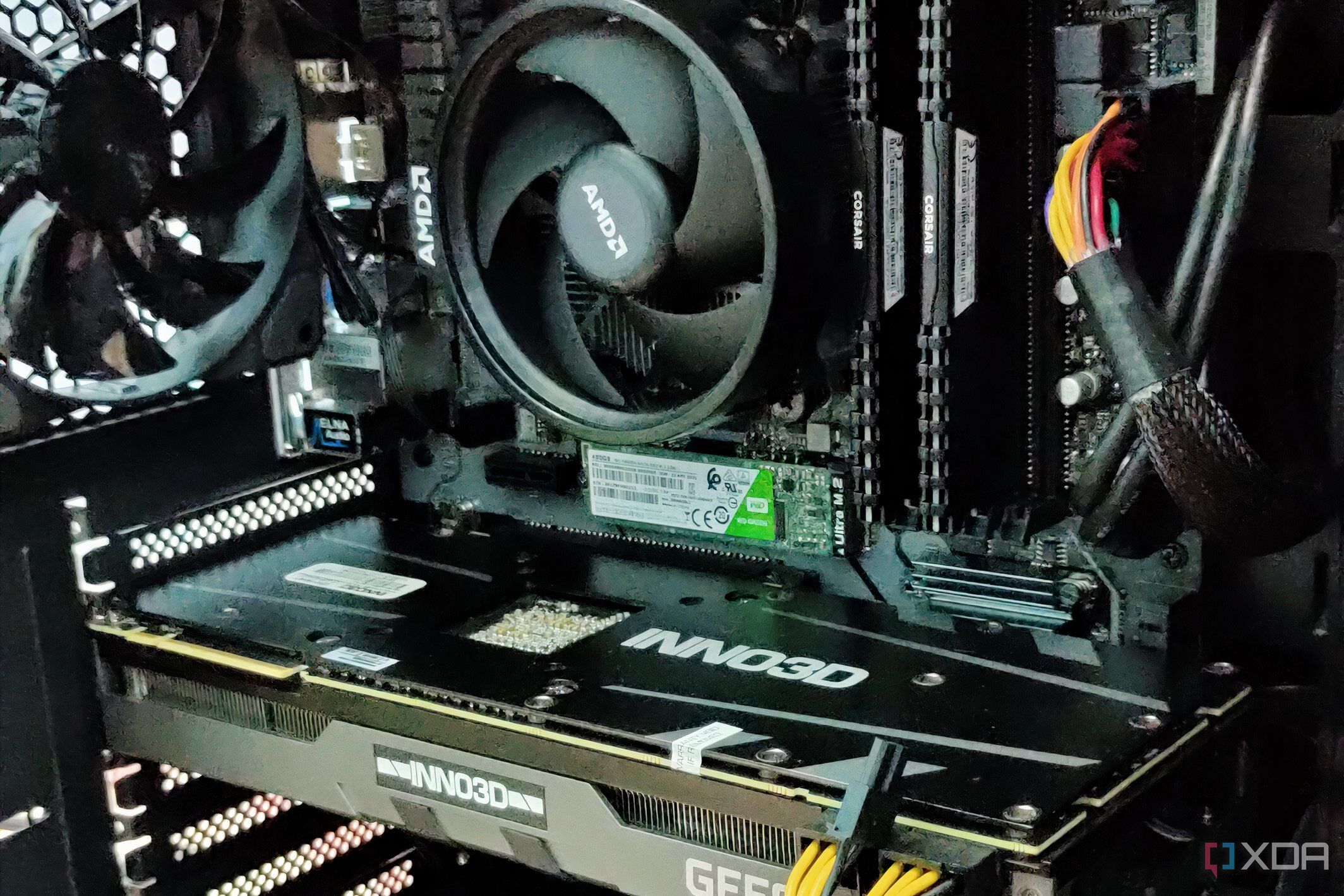 Gaming PC showing a GPU, CPU cooler, RAM, and SSD