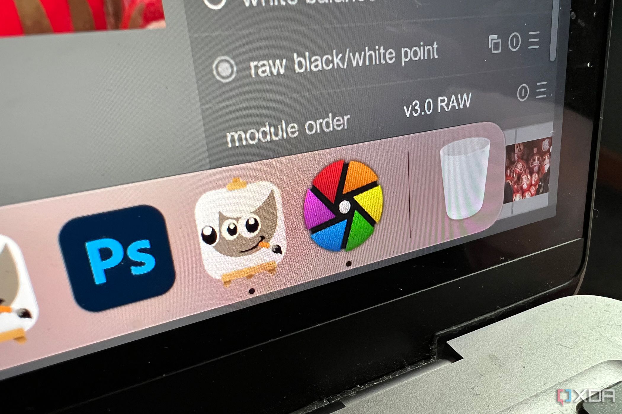 Gimp and Darktable icons on a MacBook