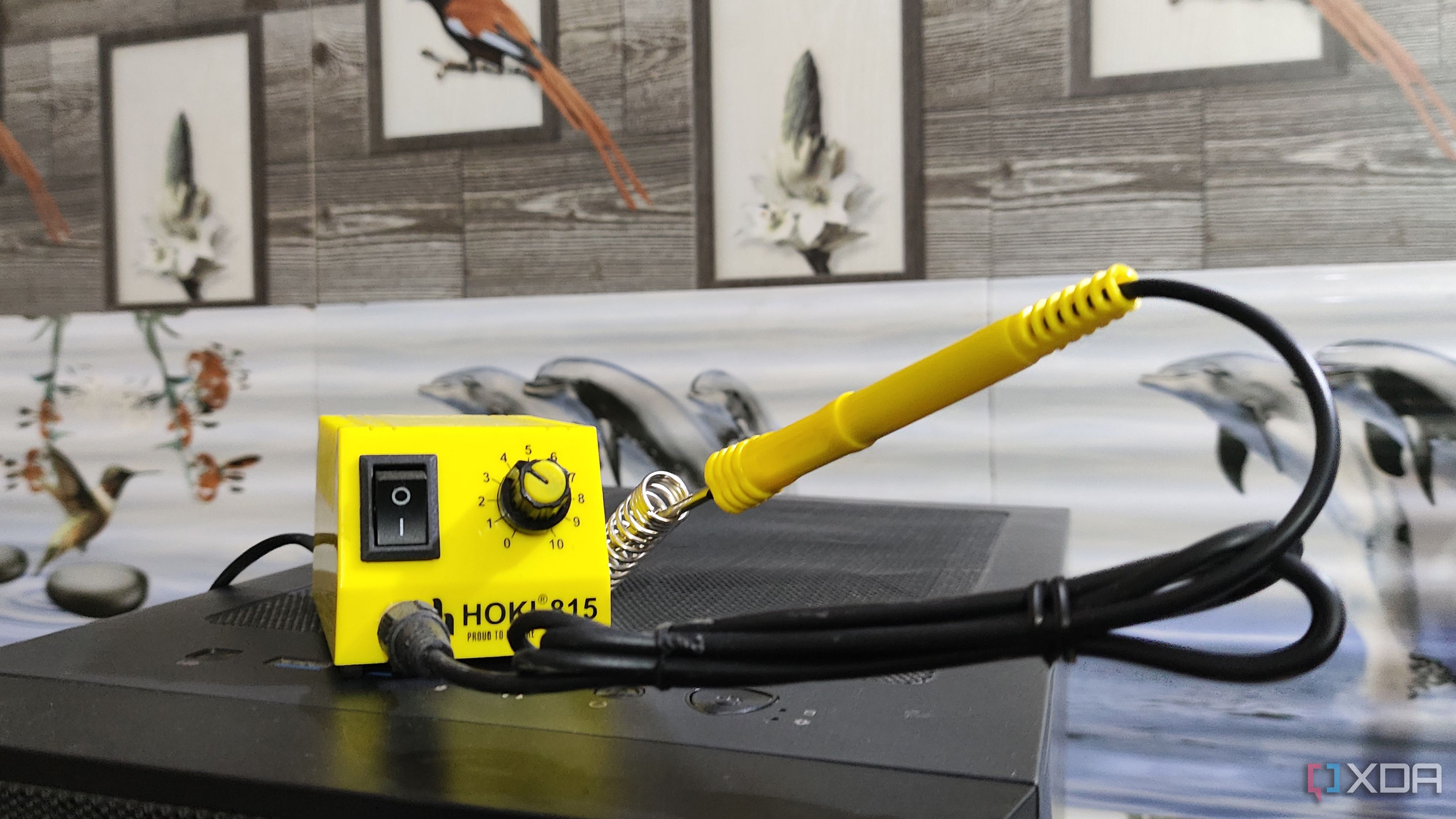 A soldering kit resting on top of a PC case