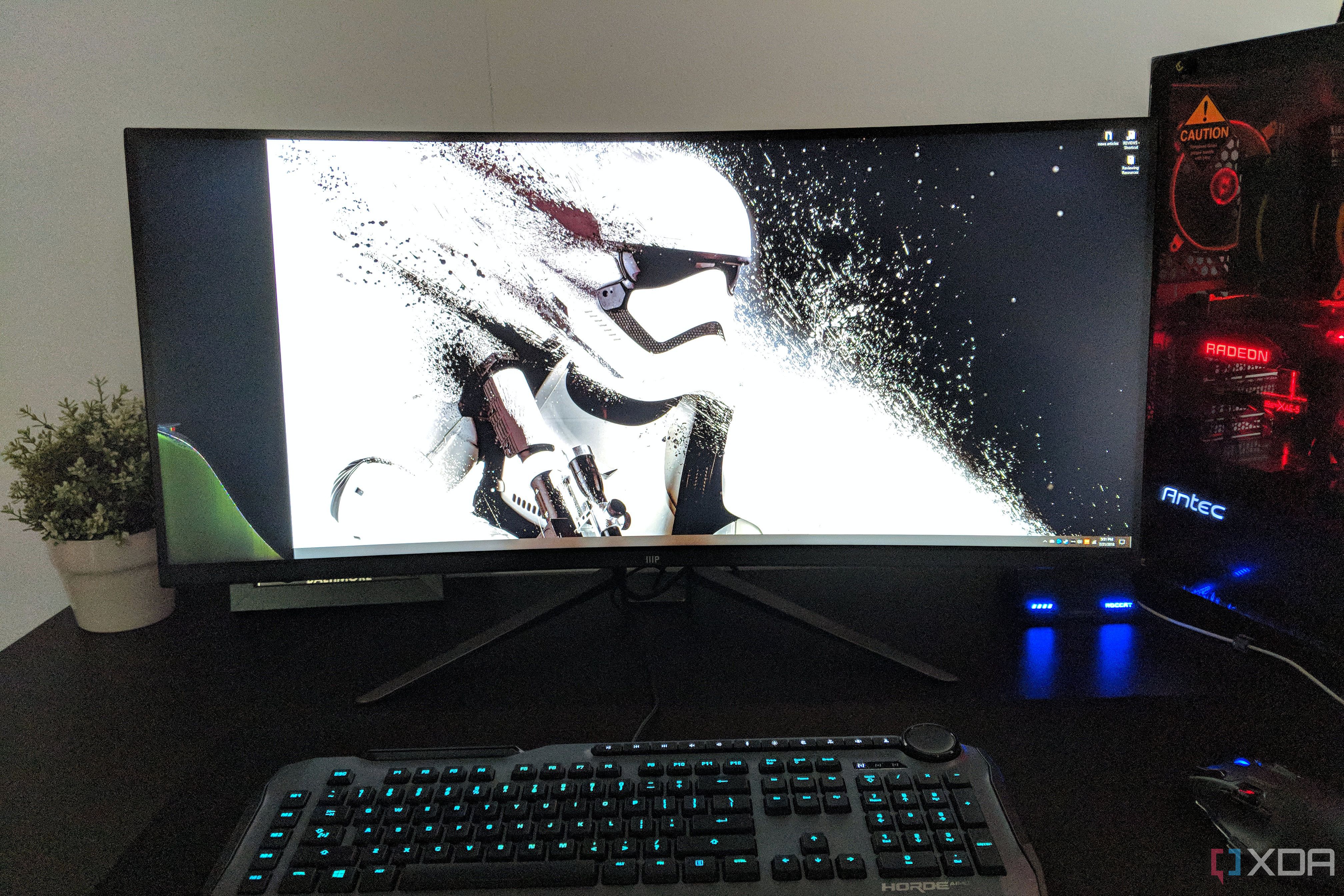 broken curved monitor panel displaying a stormtrooper wallpaper