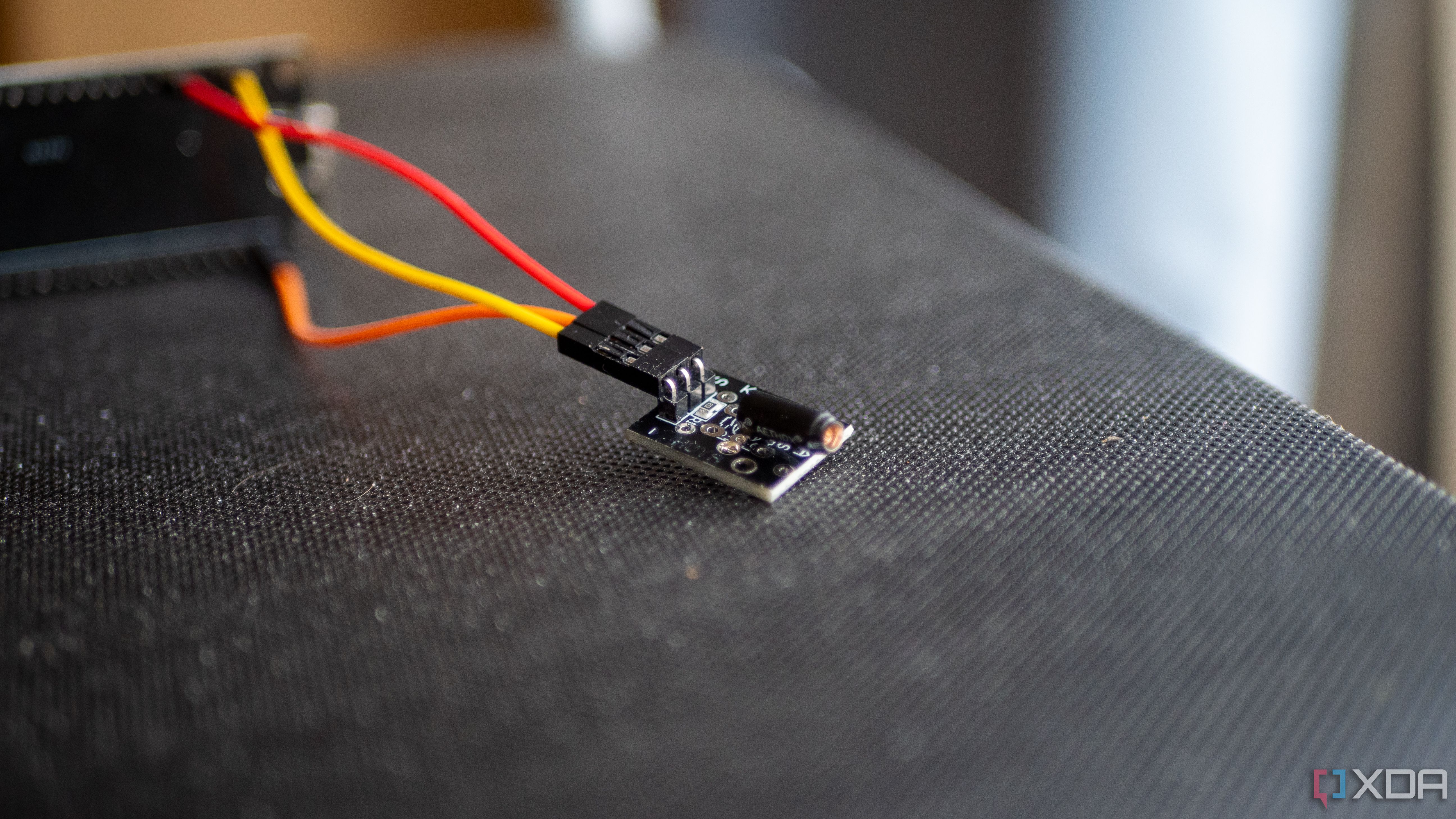 ky-002 vibration sensor plugged into an ESP32