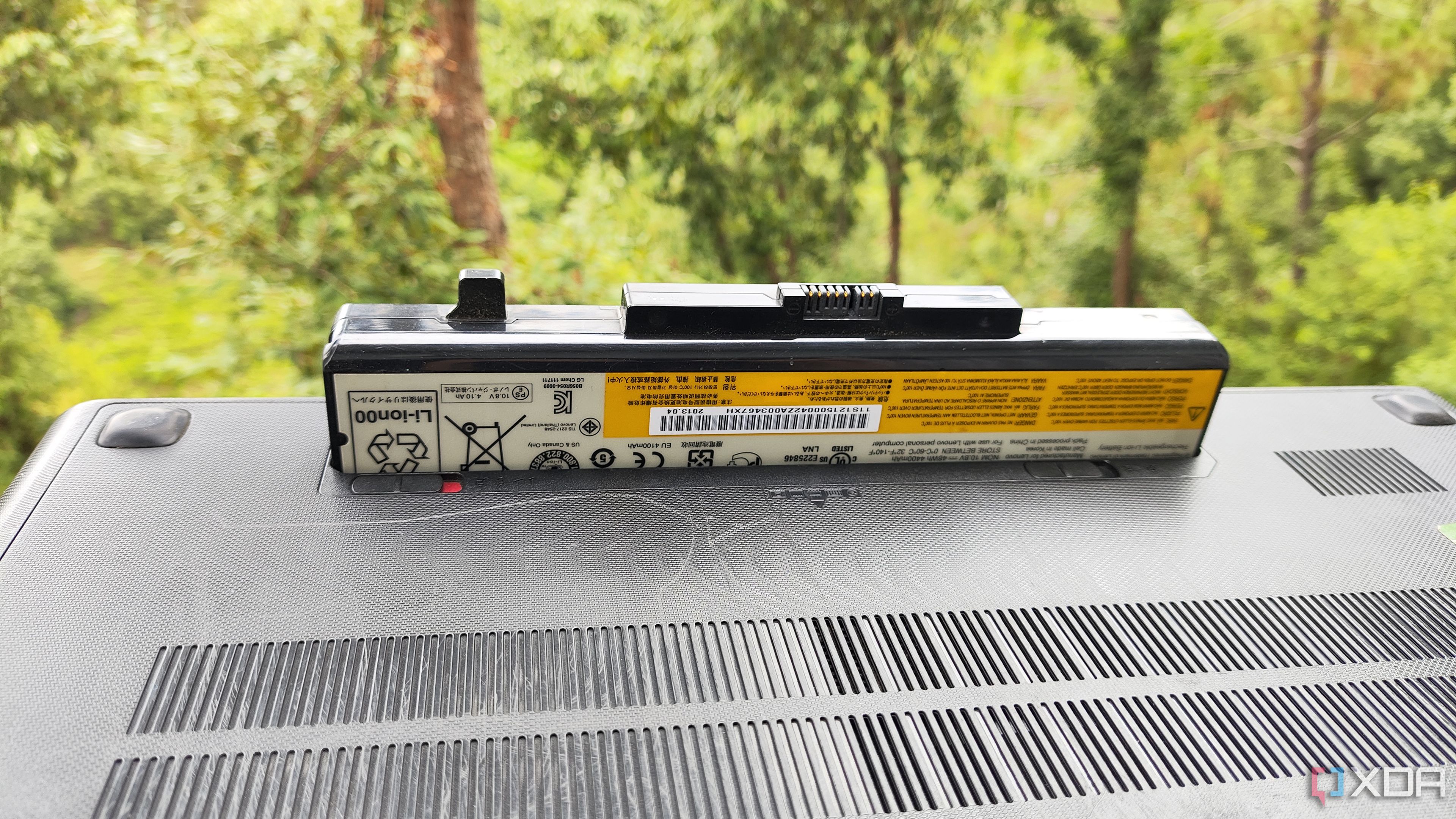 Removing the battery from an old laptop