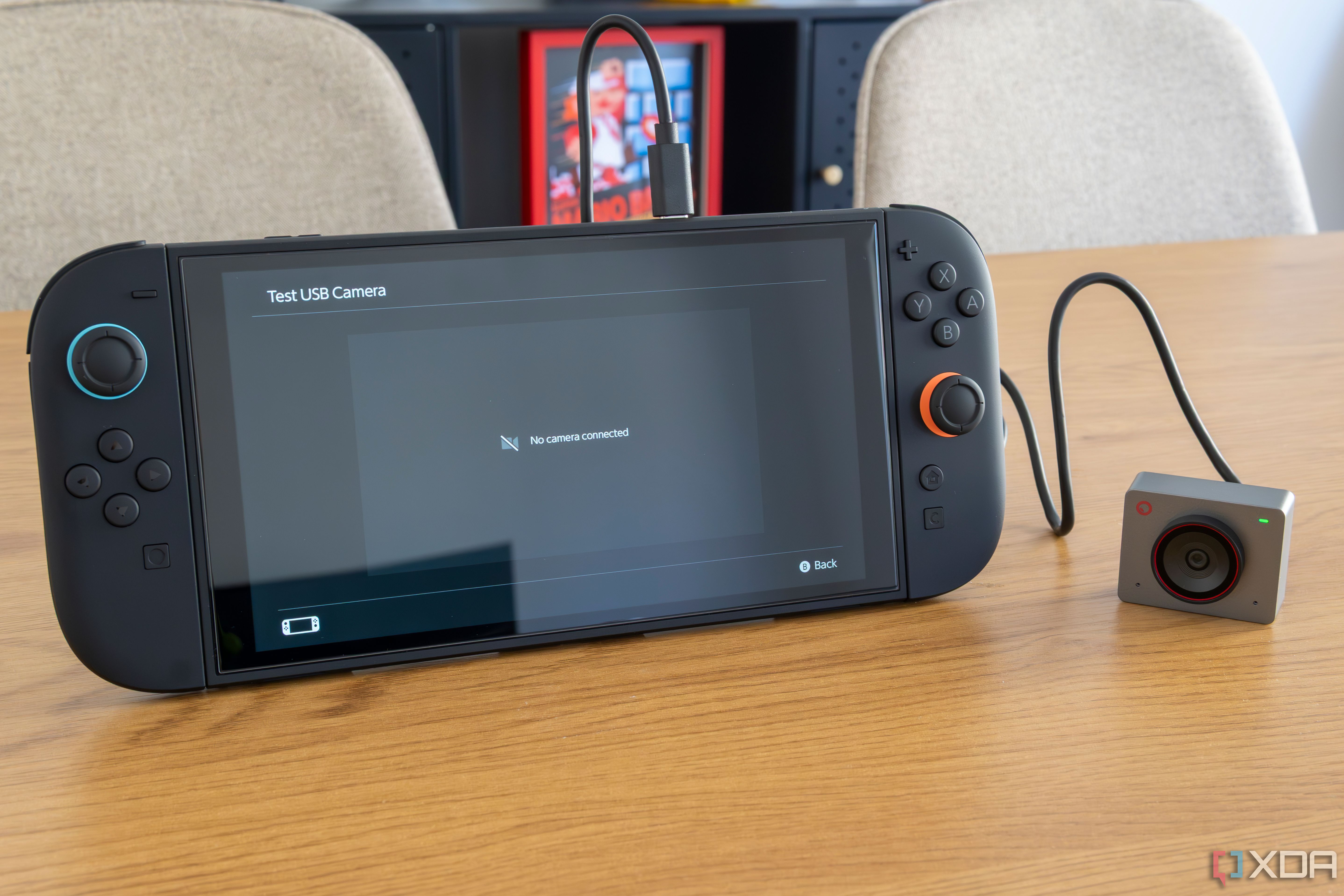 A Nintendo Switch 2 with a USB-C camera plugged in, while the operating system claims no camera is detected