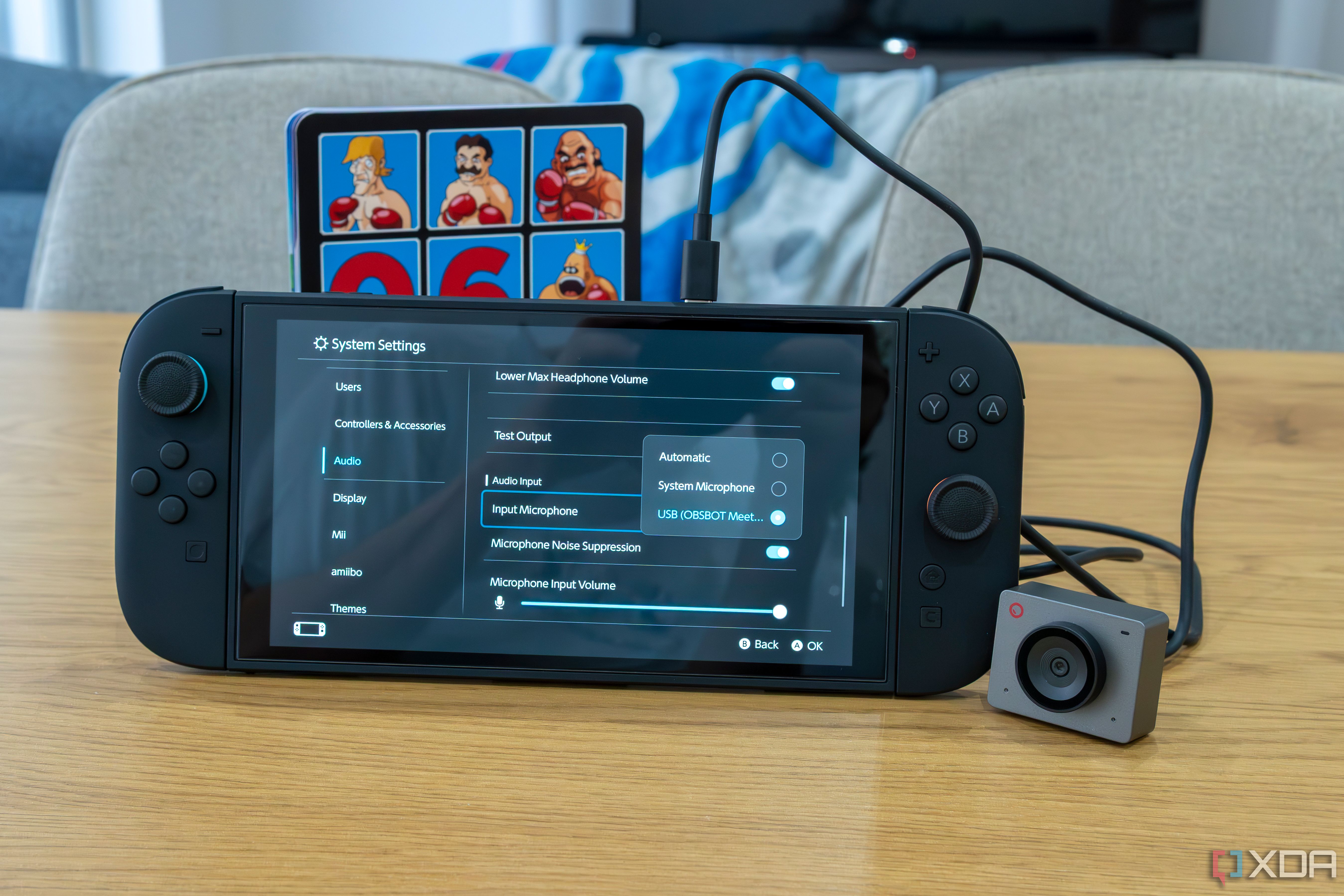 A Nintendo Switch 2 with an Obsbot Meet 2 connected. The camera's microphone is detected in the console's settings