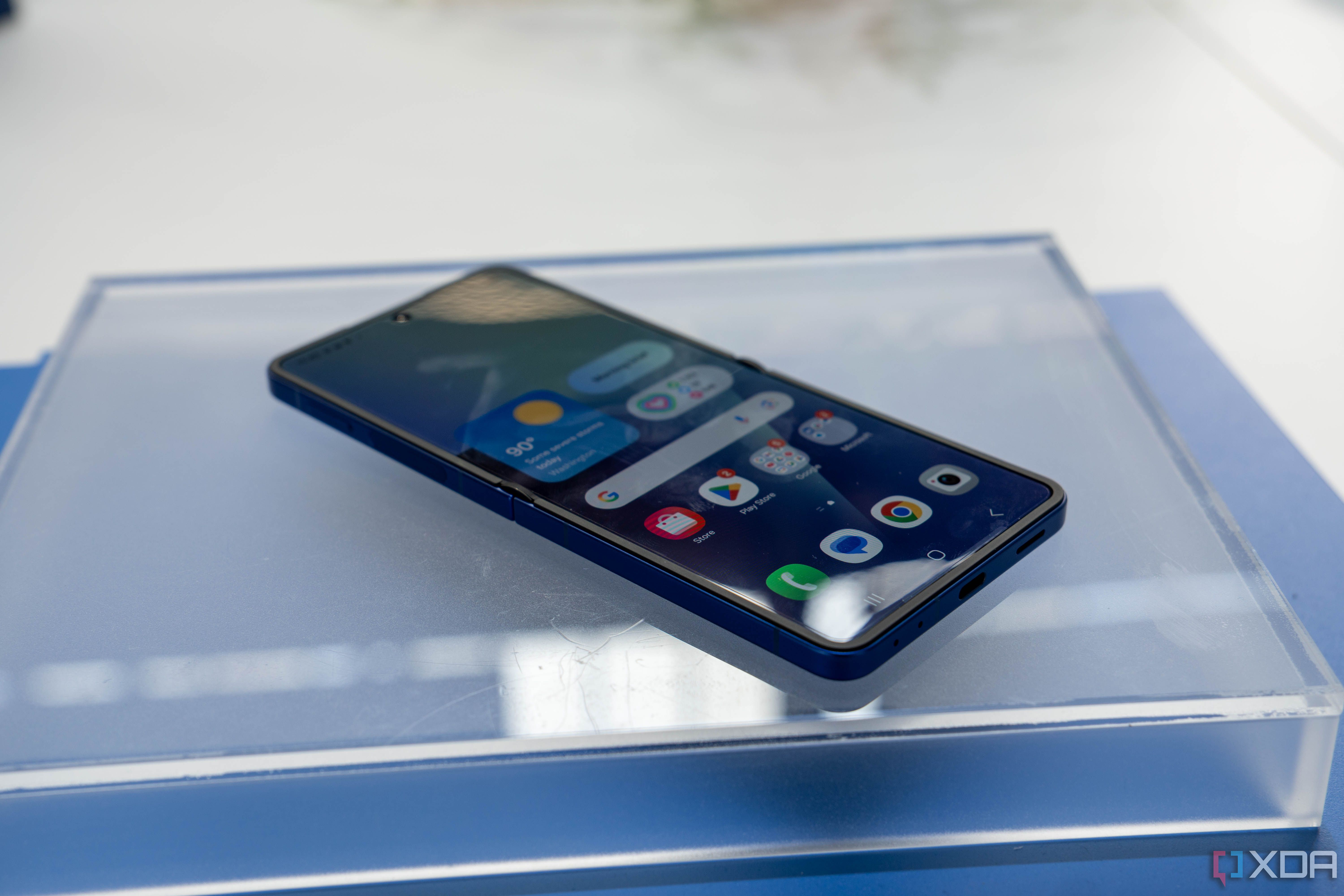 Samsung Galaxy Z Flip 7 with inner screen open and lying flat on a table
