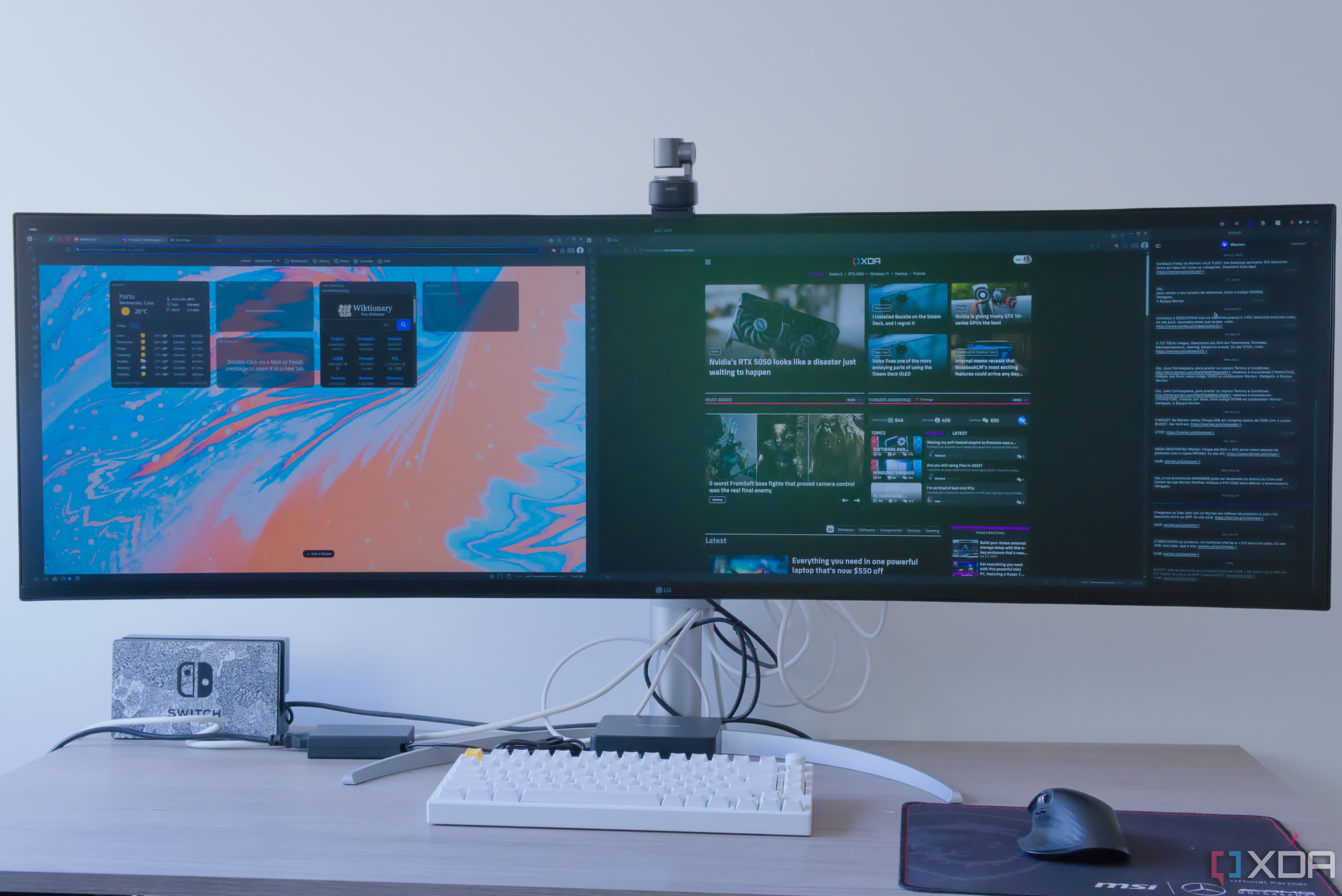 A desktop computer setup with a monitor showing various apps open in Ubuntu