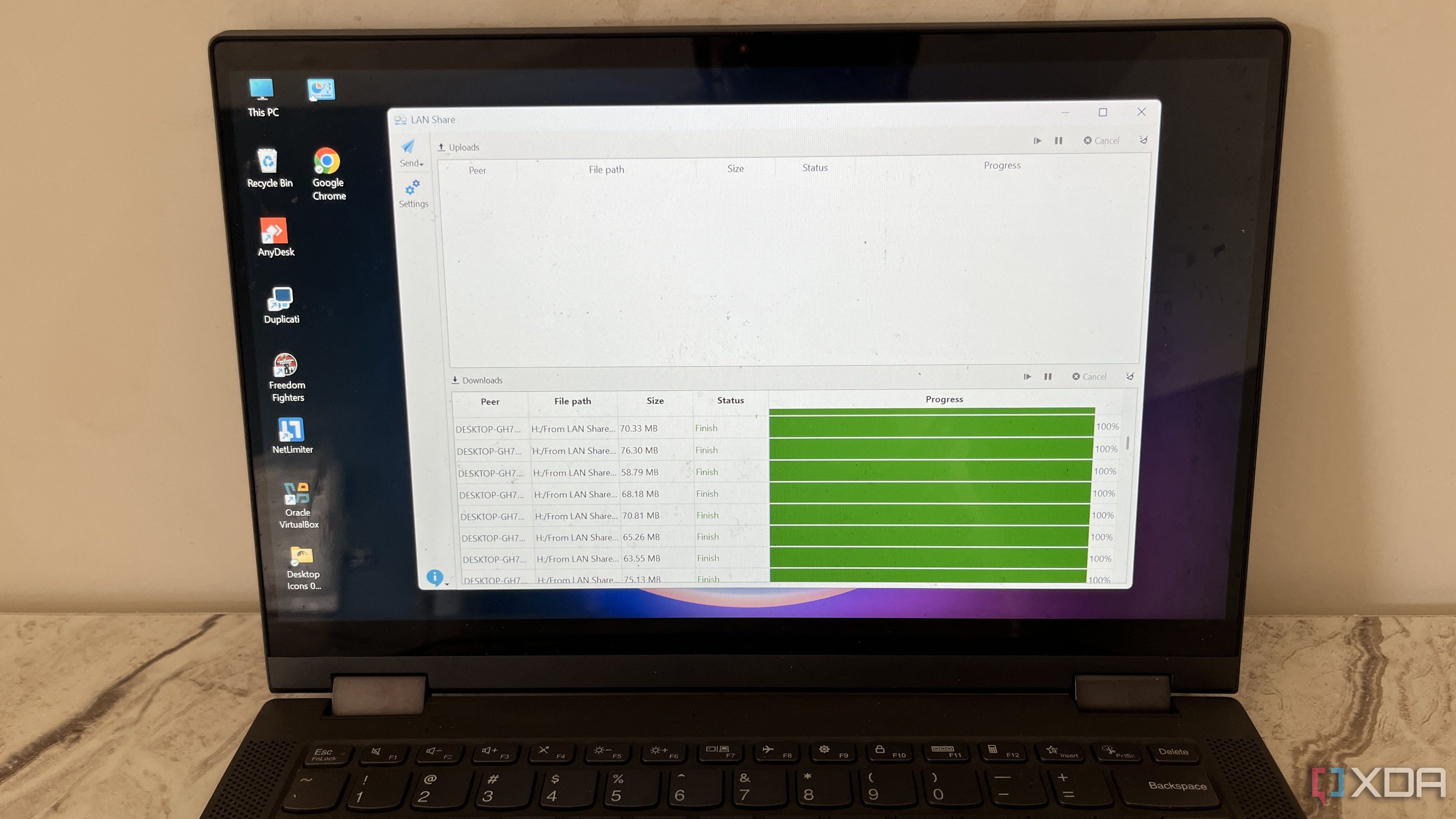 I used this free tool to share files between two Windows PCs without internet or a USB drive
