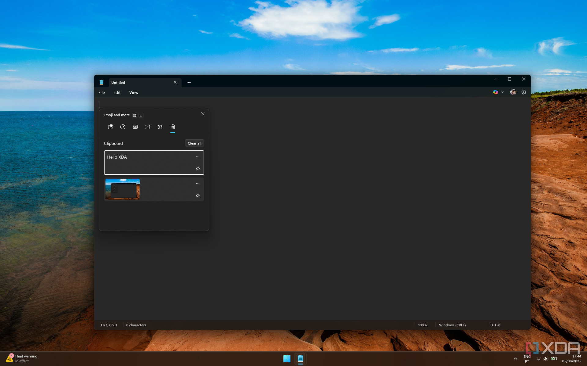 Screenshot of Windows 11 showing the clipboard history open over a Notepad window