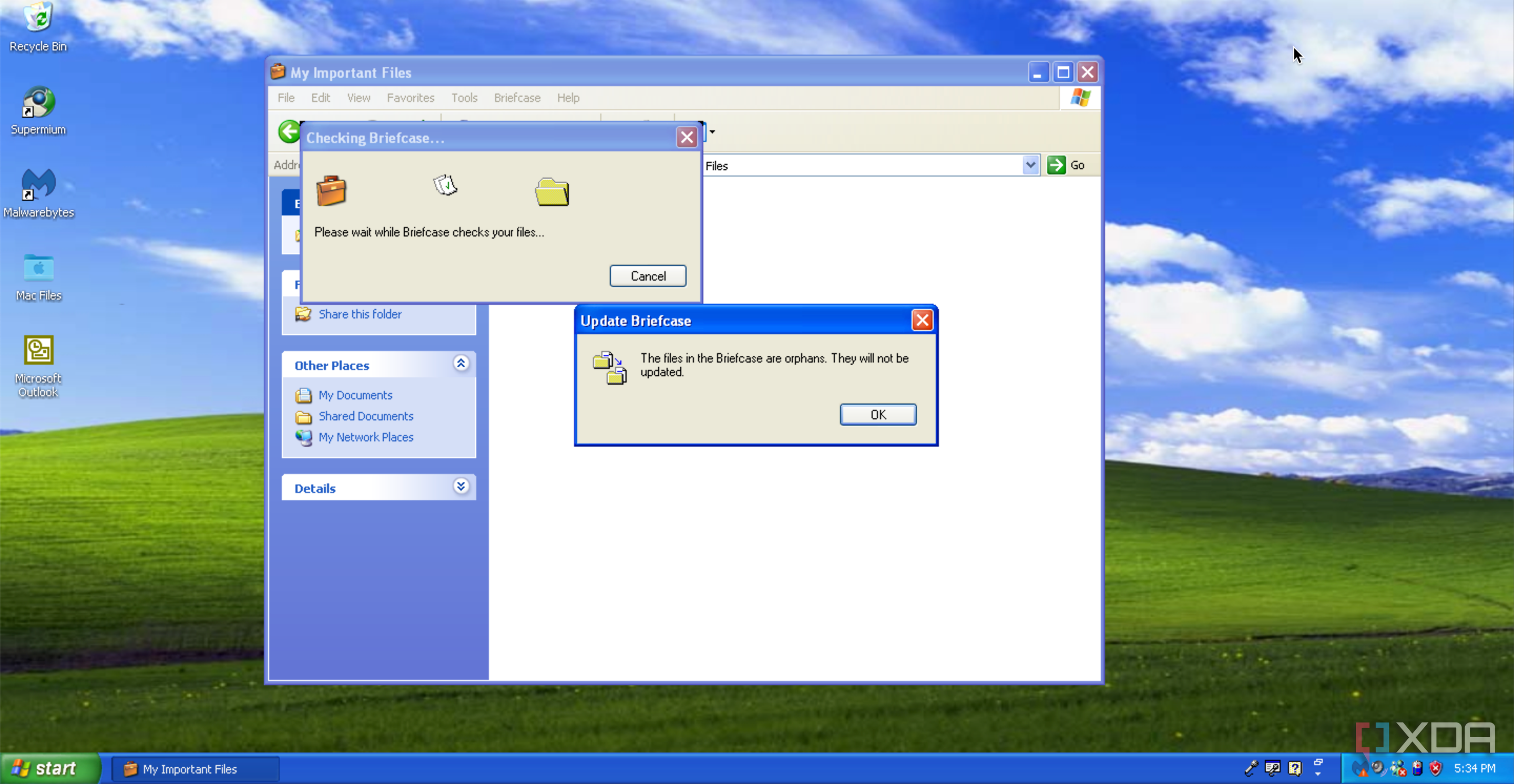 A Briefcase window, shown open in Windows Explorer on Windows XP, warning that files inside the briefcase are now orphaned, with their original files deleted.