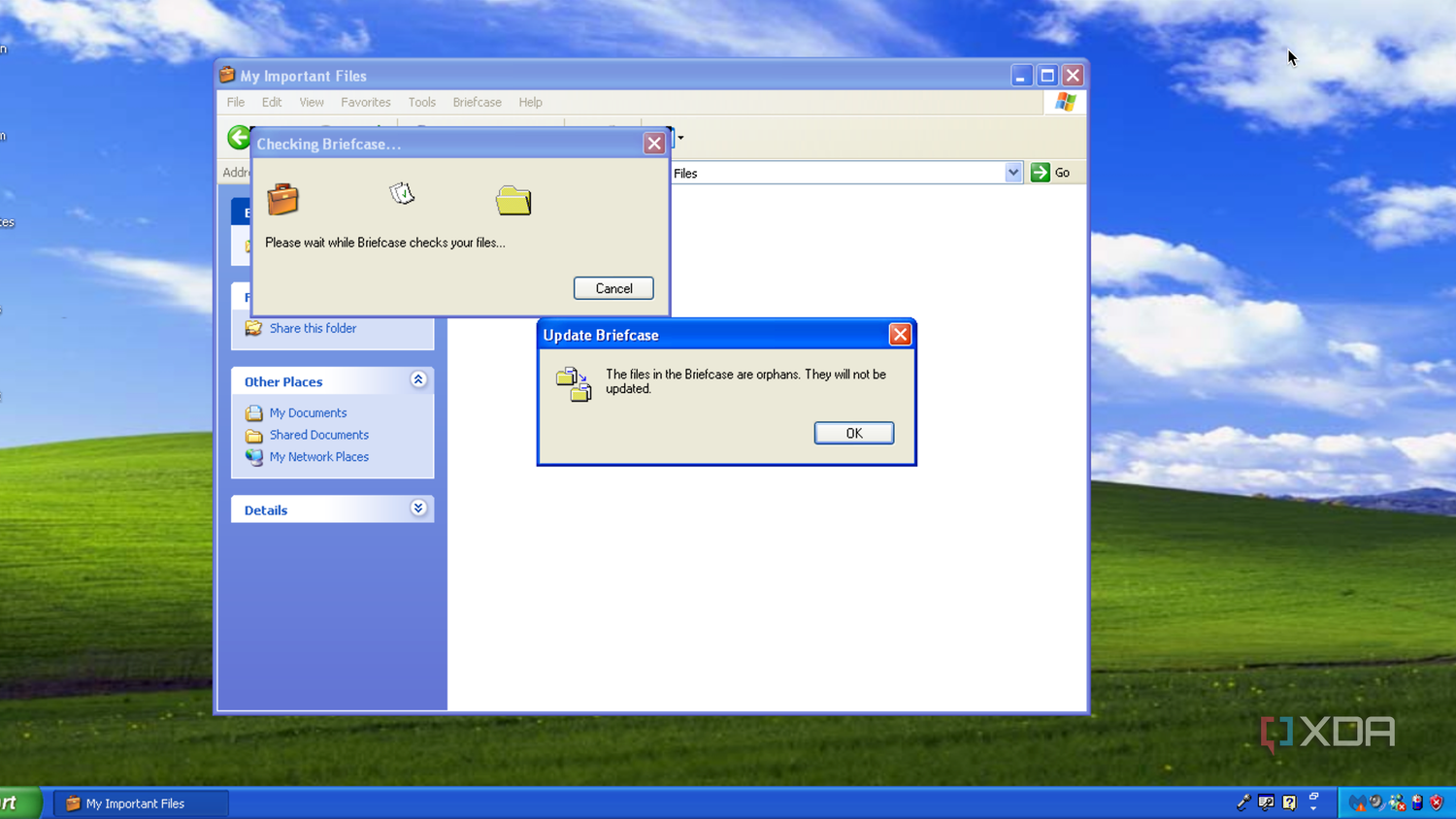 A Briefcase window, shown open in Windows Explorer on Windows XP, warning that files inside the briefcase are now orphaned, with their original files deleted.