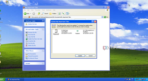 A Windows Explorer window on Windows XP, showing a Briefcase warning explaining that an original file is due to be replaced.
